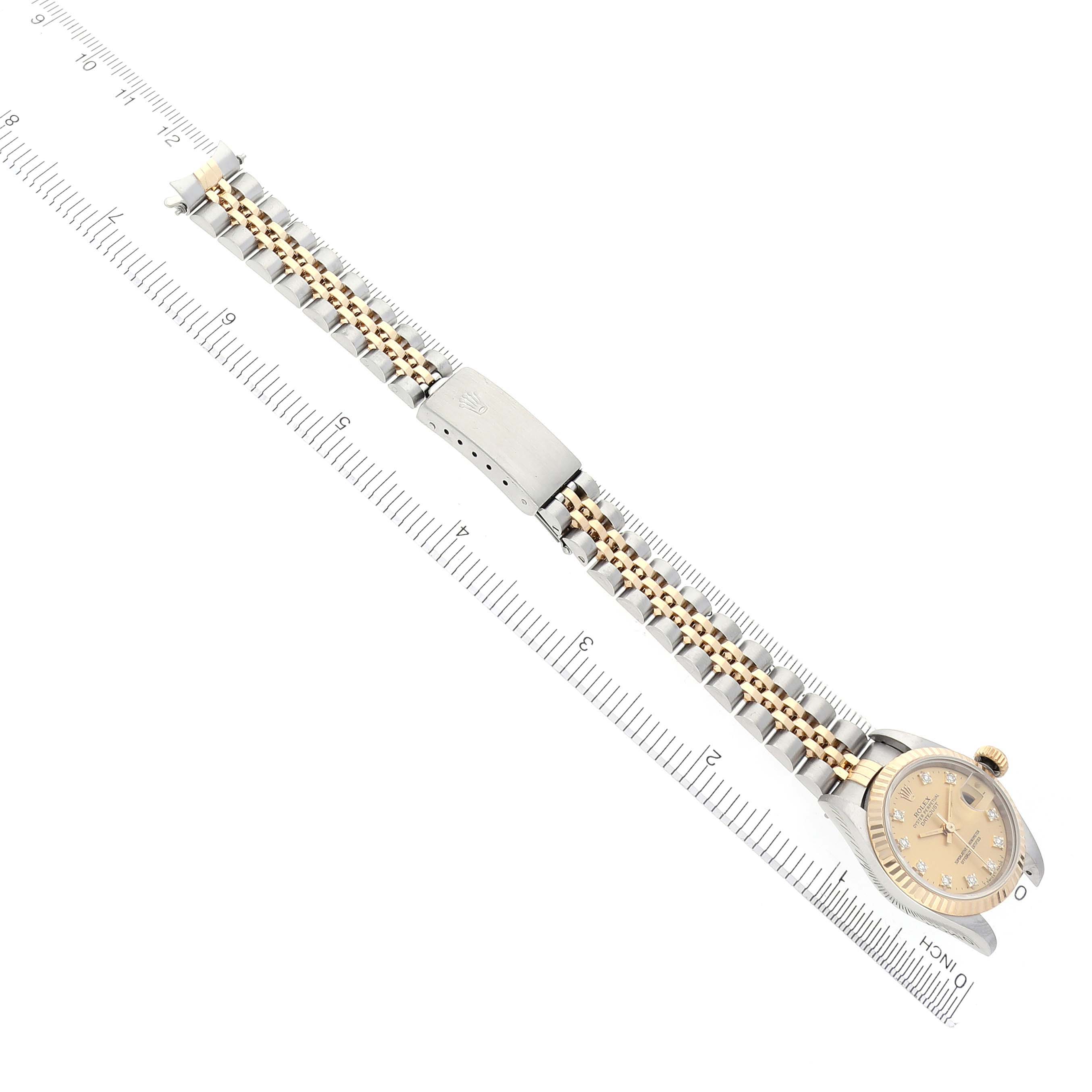 The Rolex Datejust 69173 Women's Steel and Gold (two tone) Champagne Dial 69173 Women's Steel and Gold (two tone) Champagne Dial watch is shown from an angled top view, highlighting the bracelet and clasp.