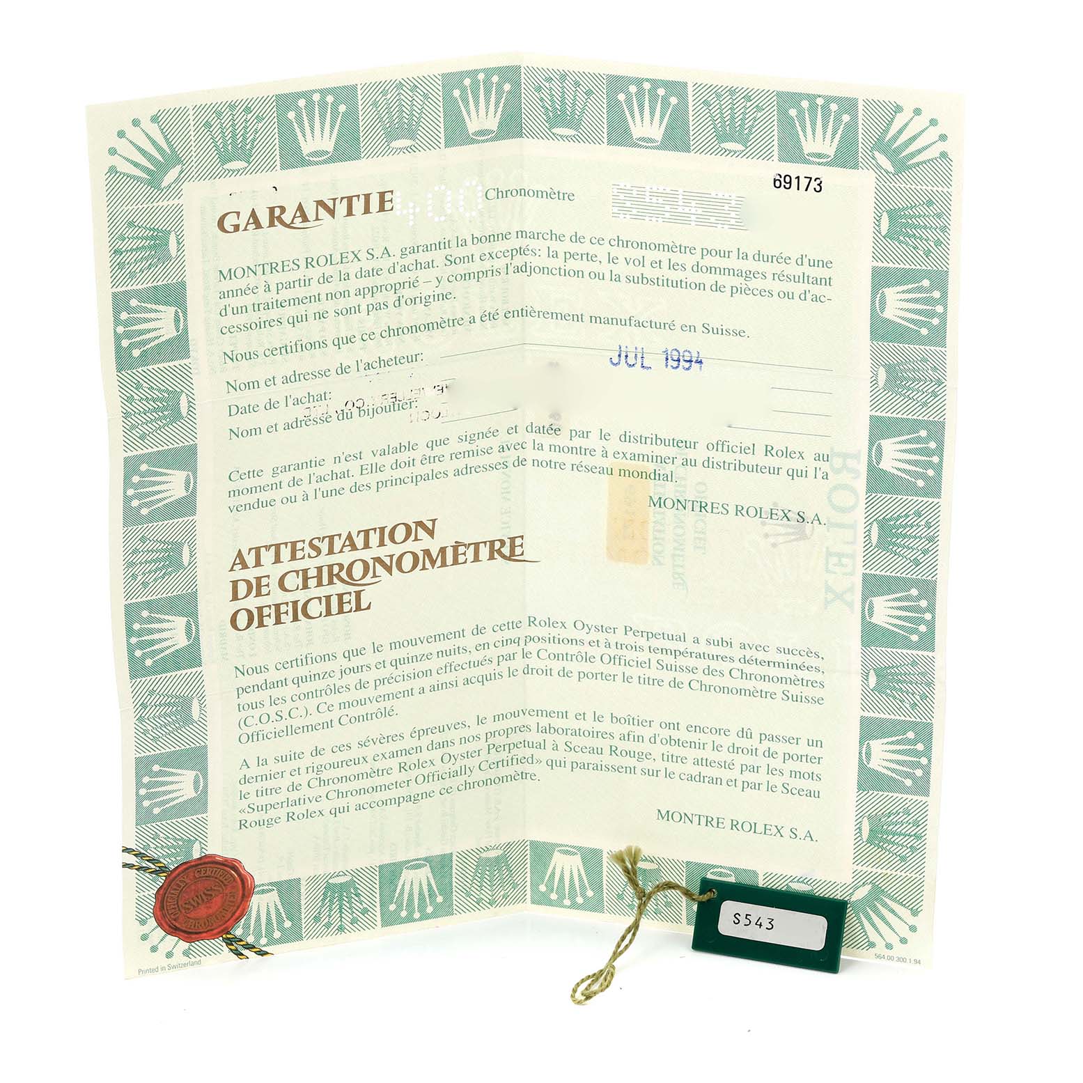 The image shows a warranty certificate and tag for a Rolex Datejust 69173 Women's Steel and Gold (two tone) Champagne Dial 69173 Women's Steel and Gold (two tone) Champagne Dial model, including official chronometer attestation details.