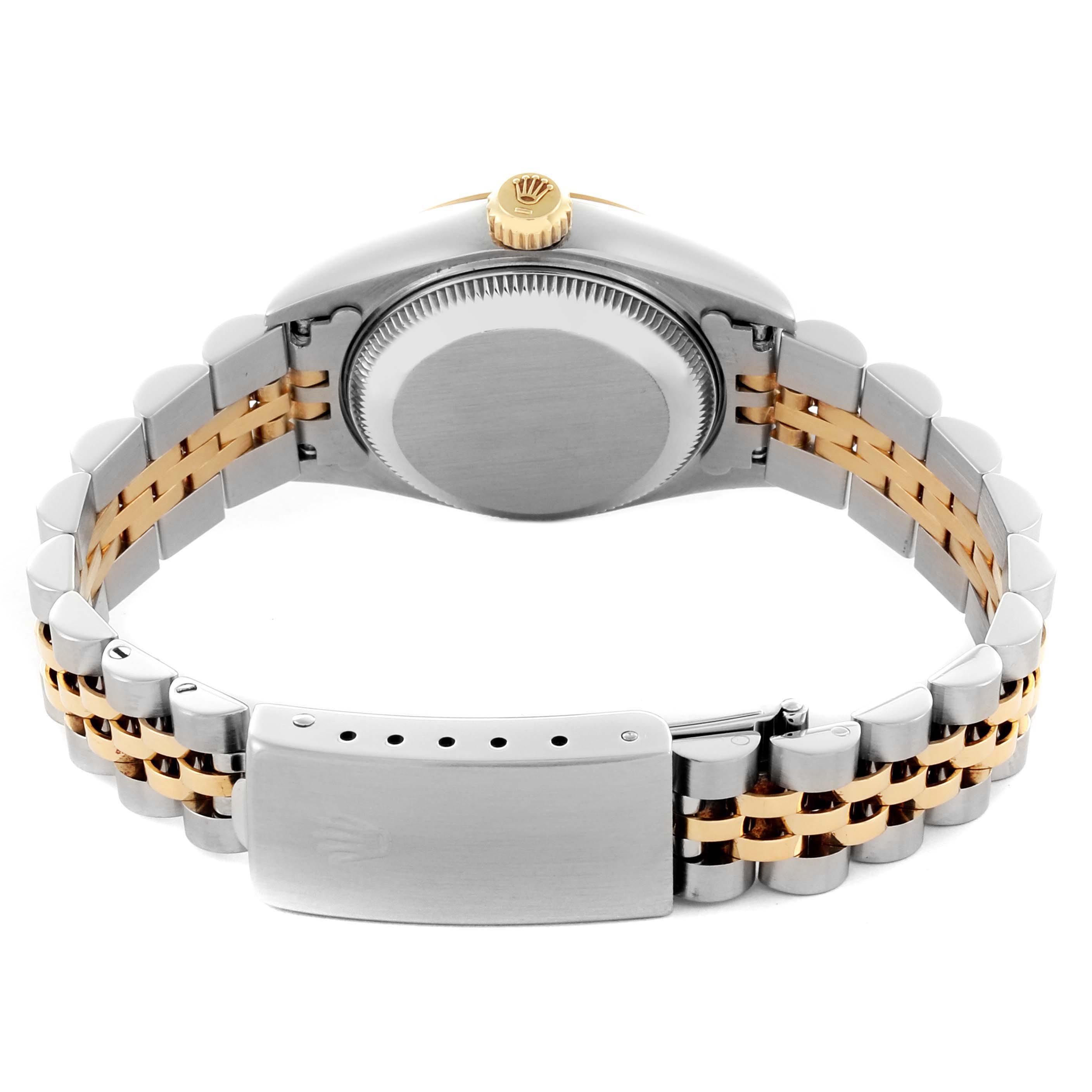 The Rolex Datejust 69173 Women's Steel and Gold (two tone) White Dial 69173 Women's Steel and Gold (two tone) White Dial watch is shown from the back, highlighting the case, crown, and two-tone bracelet clasp.