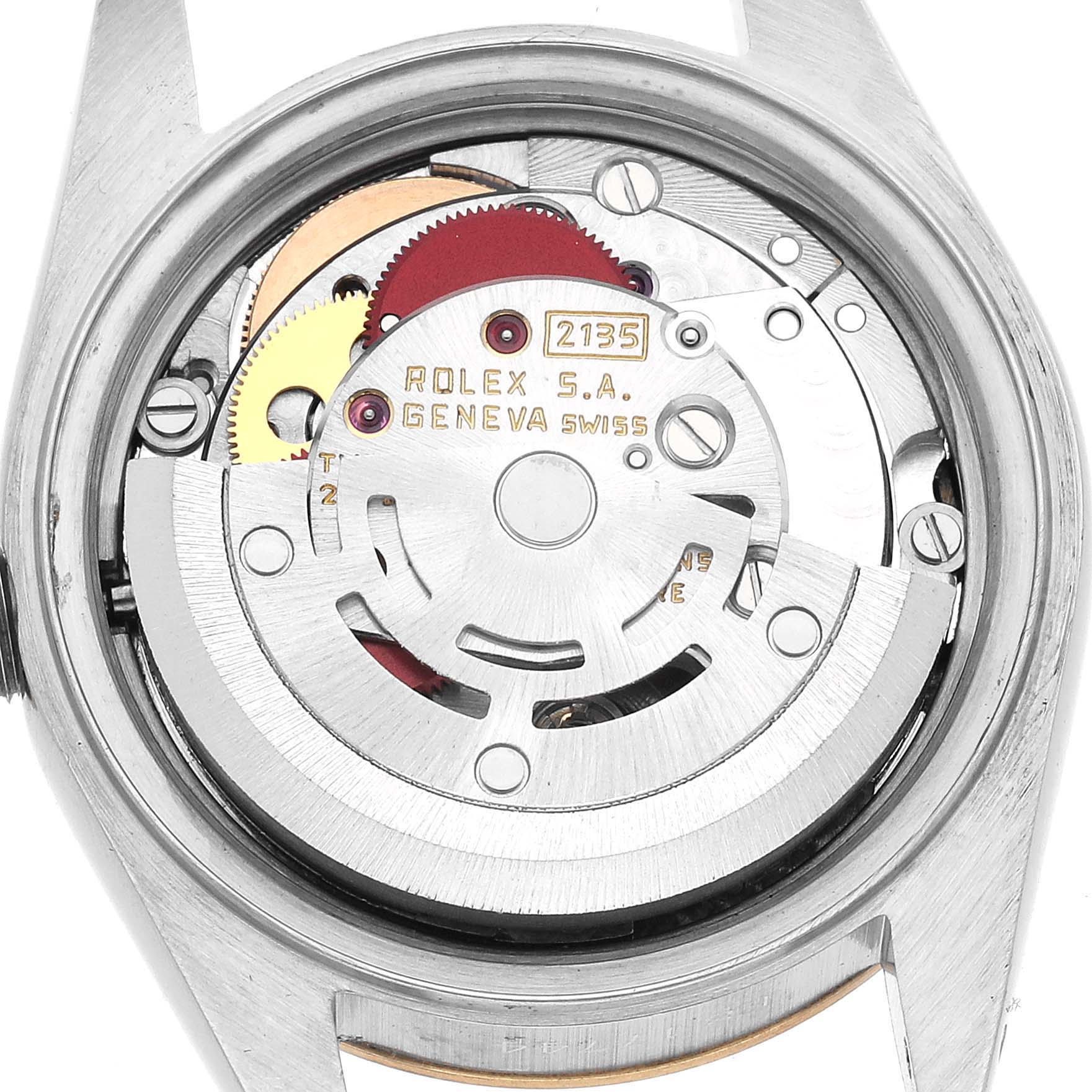 The image shows the back view of a Rolex Datejust 69173 Women's Steel and Gold (two tone) White Dial, highlighting its movement and gears.