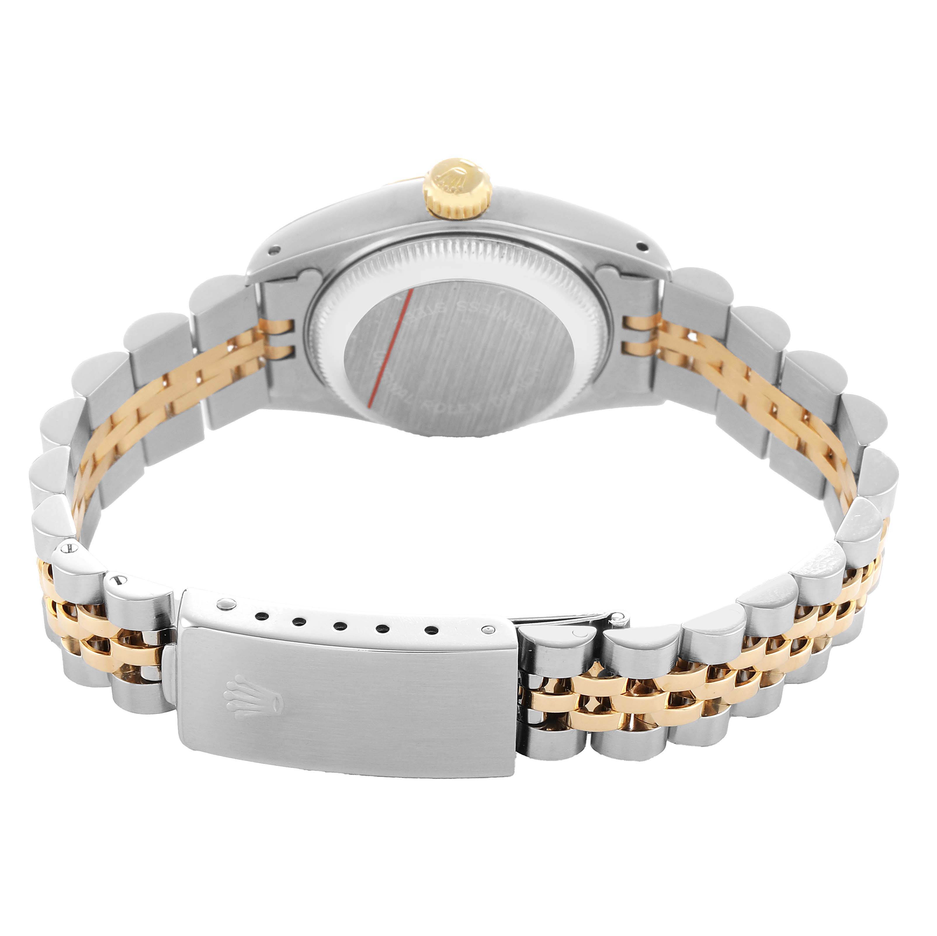 The image shows the back view of a Rolex Datejust 69173 Women's Steel and Gold (two tone) White Dial, highlighting the bracelet and clasp.