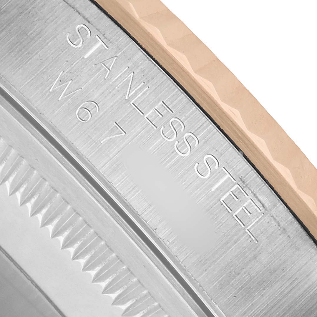 The image shows a close-up of the Rolex Datejust 16233 Men's Steel and Gold (two tone) White Dial's stainless steel case and two-tone edge.