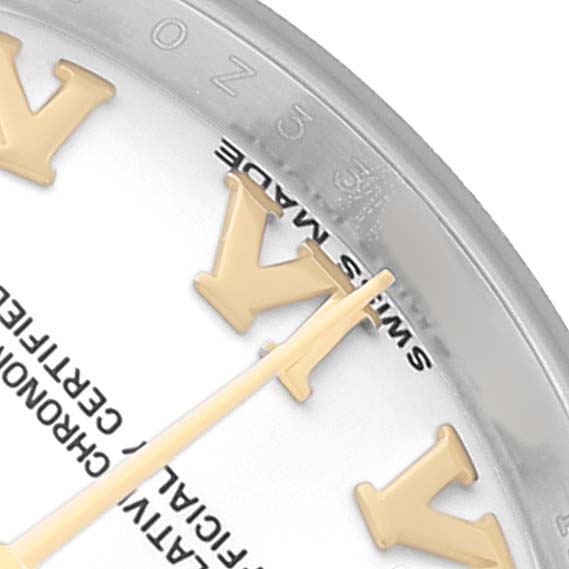 The image shows a close-up of the dial of a Rolex Datejust 179173 Women's Steel and Gold (two tone) White Dial, focusing on the indices and hands.