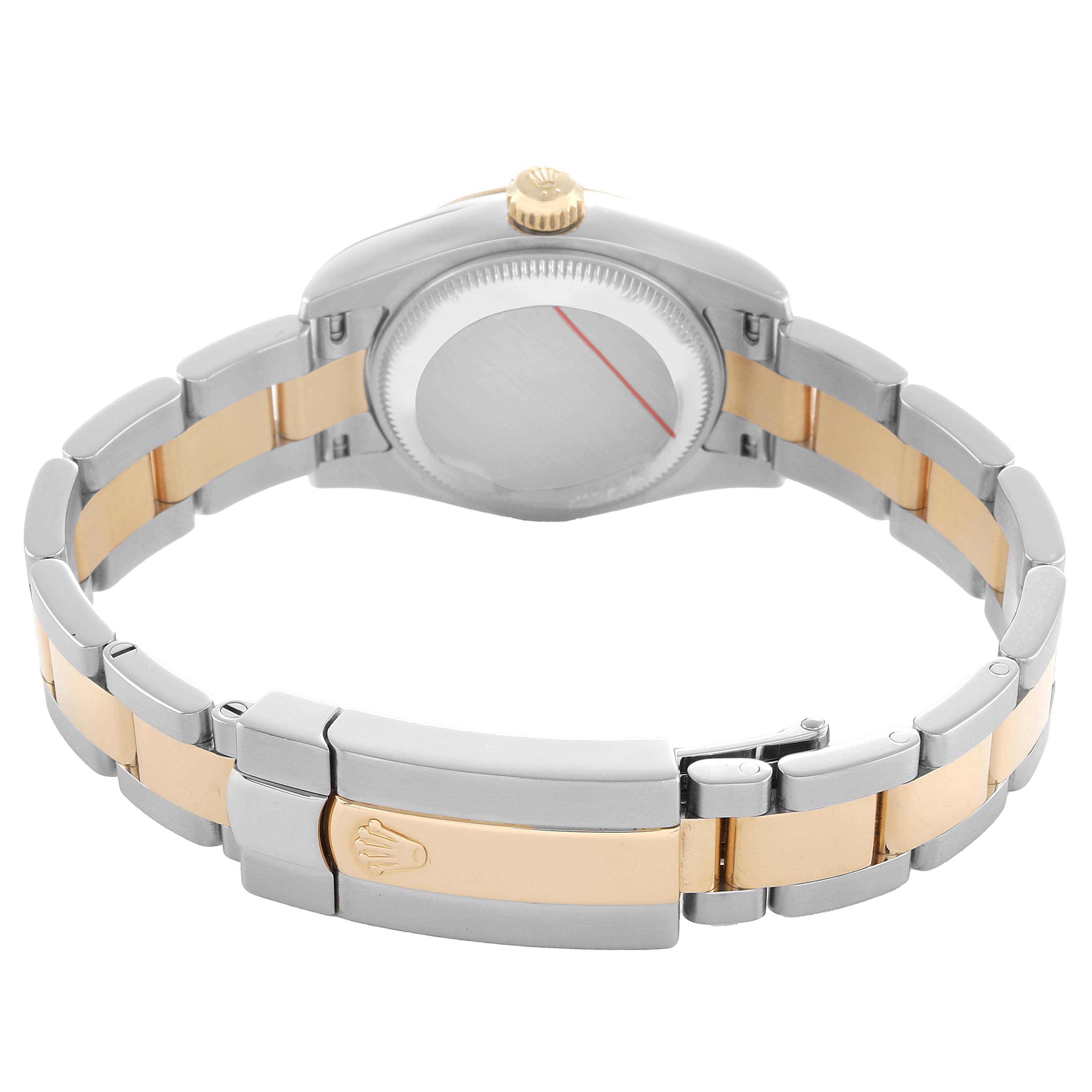 The Rolex Datejust 179173 Women's Steel and Gold (two tone) White Dial watch is shown from the back, highlighting the two-tone bracelet and closed clasp.