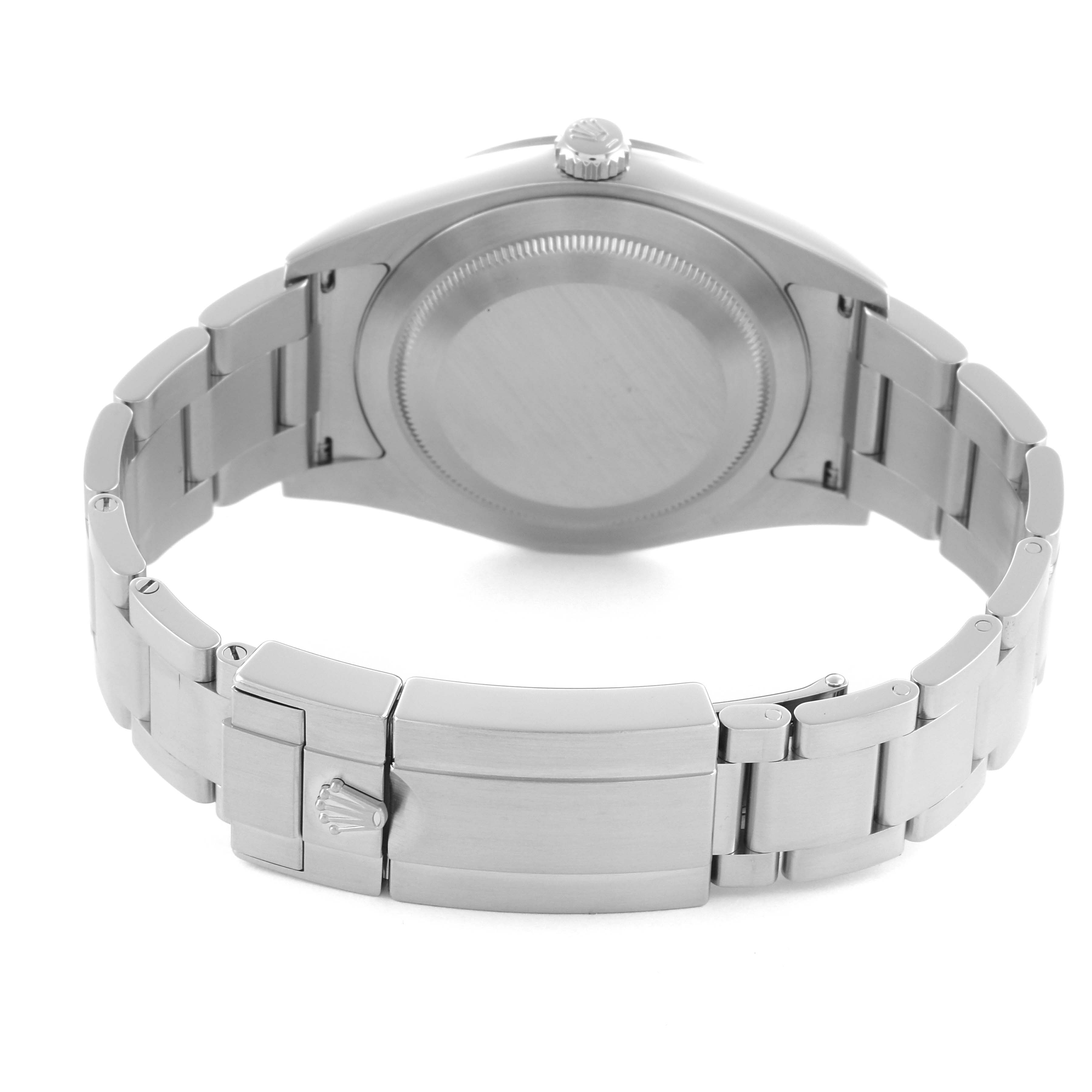 The Rolex Explorer 214270 Men
s Stainless Steel Black Dial 214270 Men
s Stainless Steel Black Dial watch is shown from the back, highlighting the case, bracelet, and clasp.