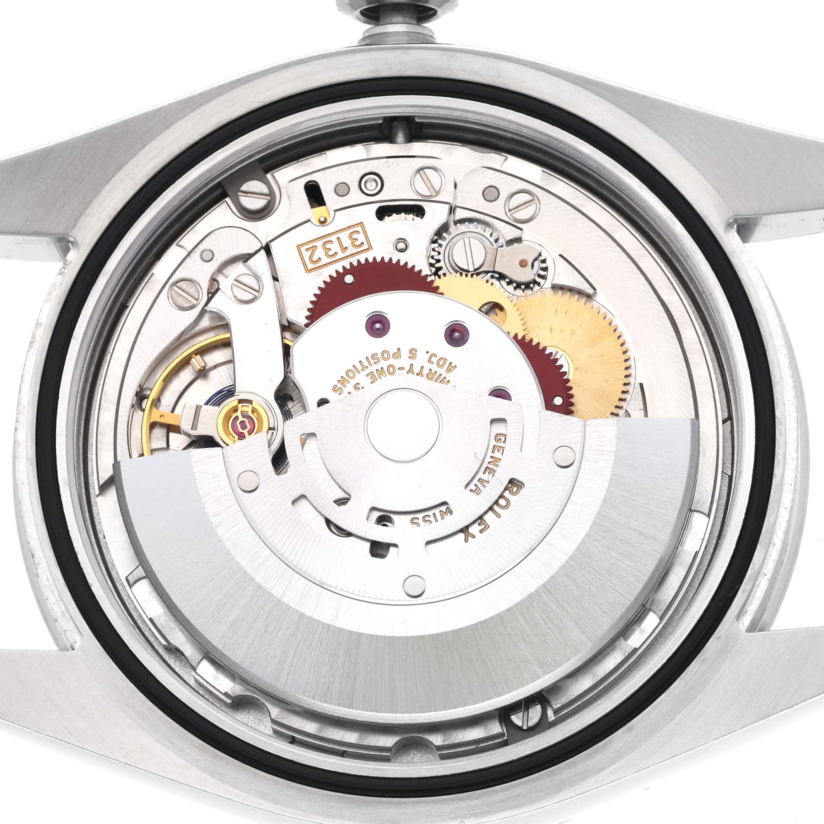 The image shows the back view of a Rolex Explorer 214270 Men
s Stainless Steel Black Dial 214270 Men
s Stainless Steel Black Dial watch, highlighting its internal movement and components.