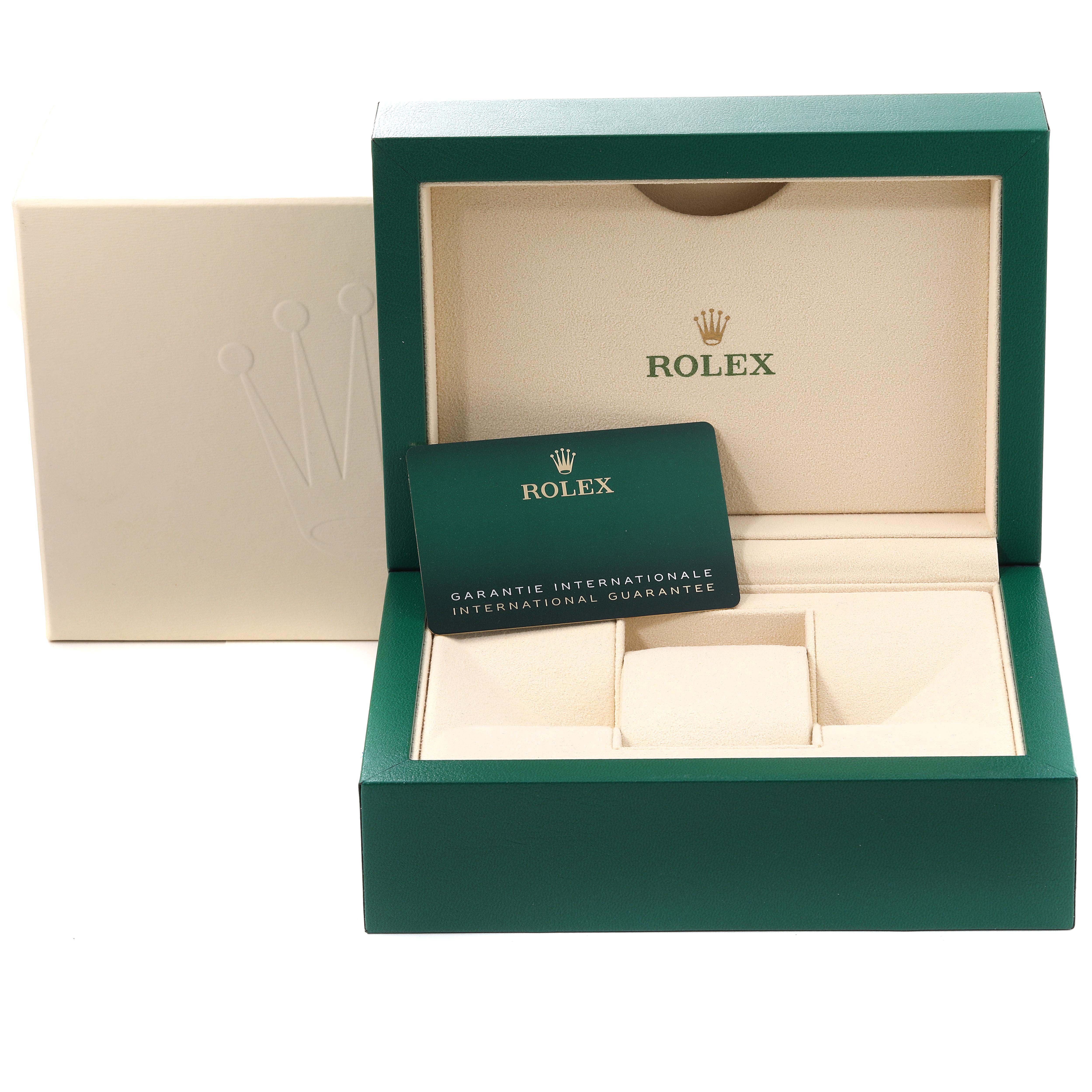 The image shows an open Rolex GMT-Master 126720VTNR-0001 Men
s Stainless Steel Black Dial 126720VTNR-0001 Men
s Stainless Steel Black Dial watch box and an international guarantee card.