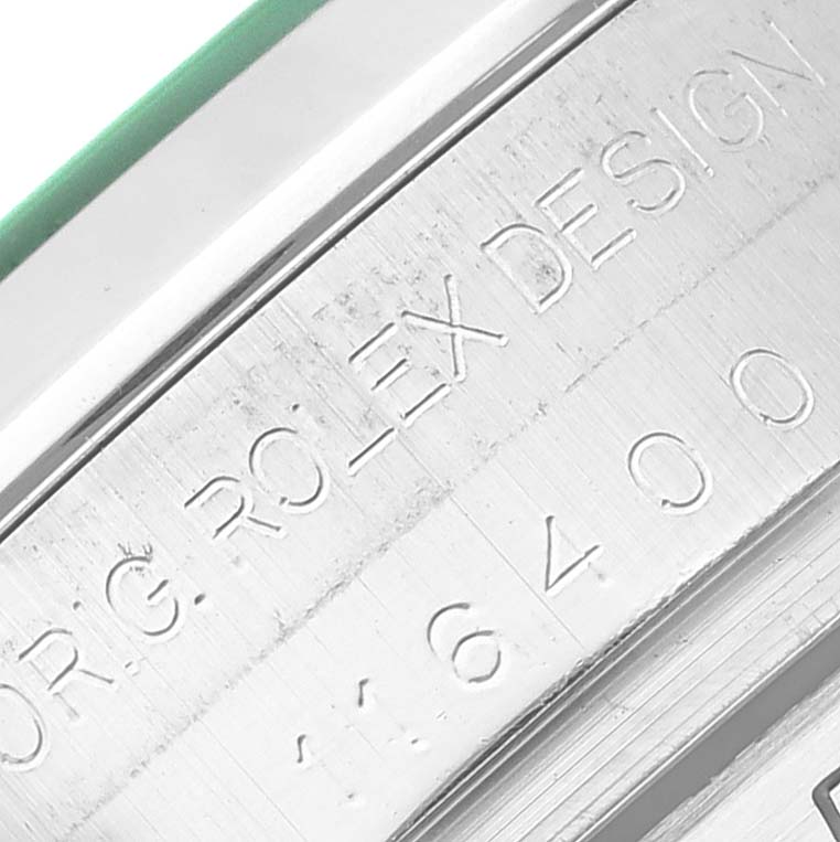 This close-up image shows the engraved details on the case side of a Rolex Milgauss 116400GV Men's Stainless Steel Blue Dial 116400GV Men's Stainless Steel Blue Dial watch.