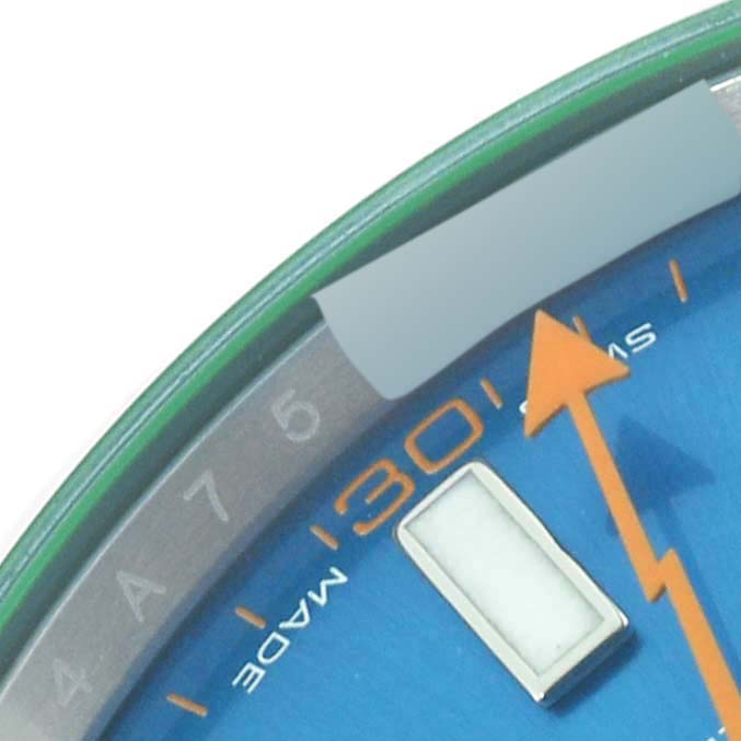 The close-up image shows the dial, minute markers, and second hand of a Rolex Milgauss 116400GV Men's Stainless Steel Blue Dial 116400GV Men's Stainless Steel Blue Dial watch.