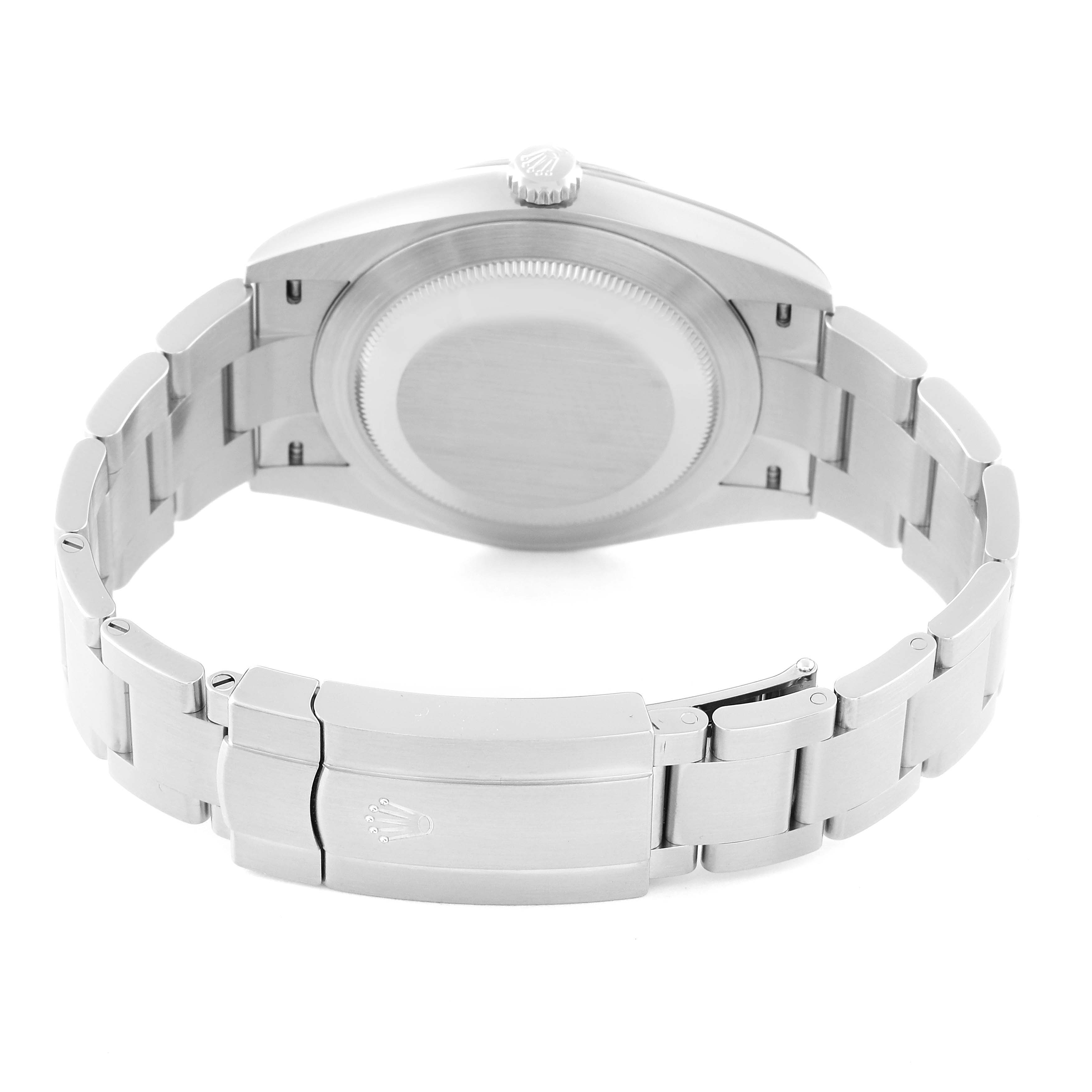 The image shows the back and bracelet clasp of a Rolex Oyster Perpetual 124300 Men
s Stainless Steel Green Dial 124300 Men
s Stainless Steel Green Dial watch at an angle focusing on the case back and bracelet.