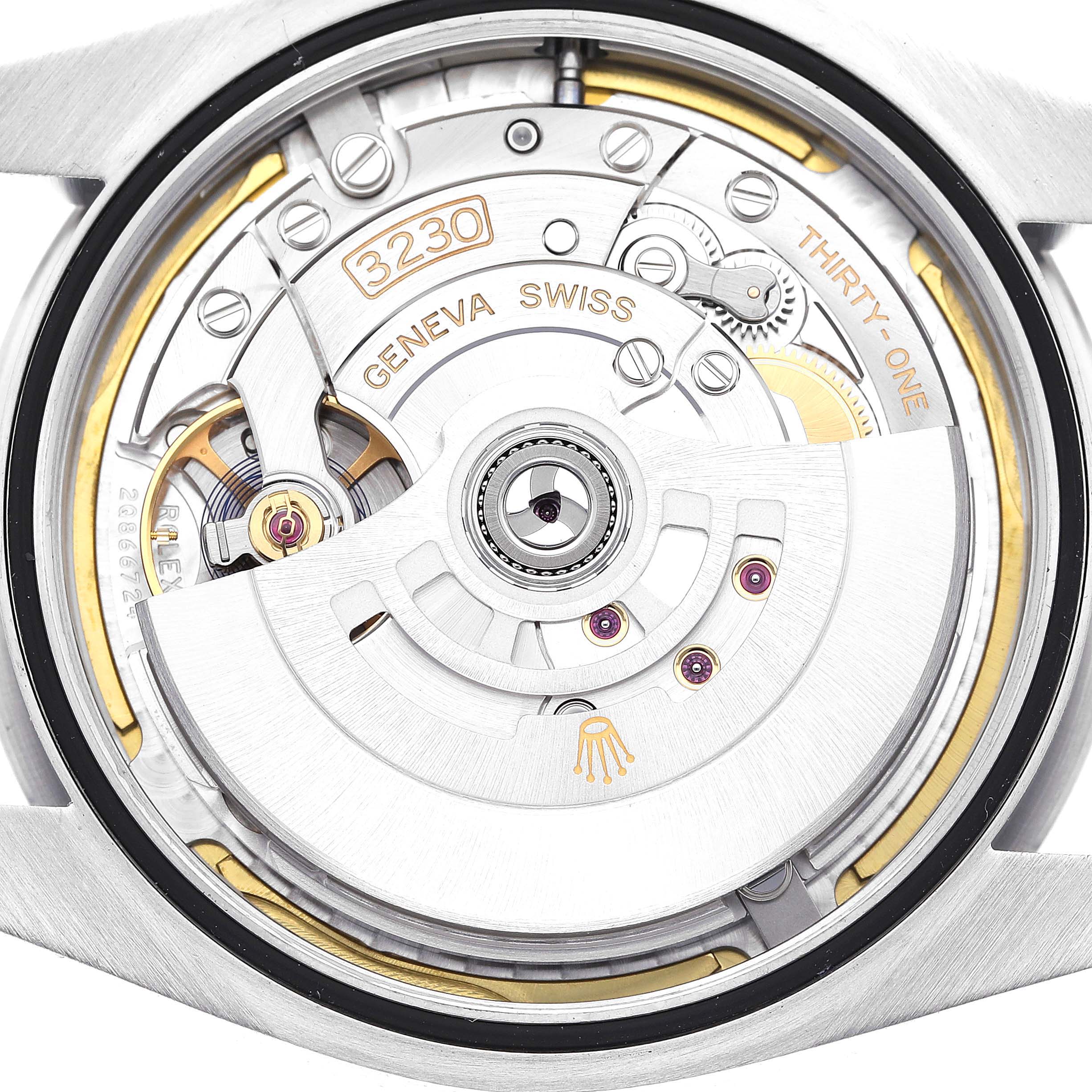 This image shows the movement of the Rolex Oyster Perpetual 124300 Men
s Stainless Steel Green Dial 124300 Men
s Stainless Steel Green Dial watch viewed from the back, highlighting its intricate internal mechanisms.