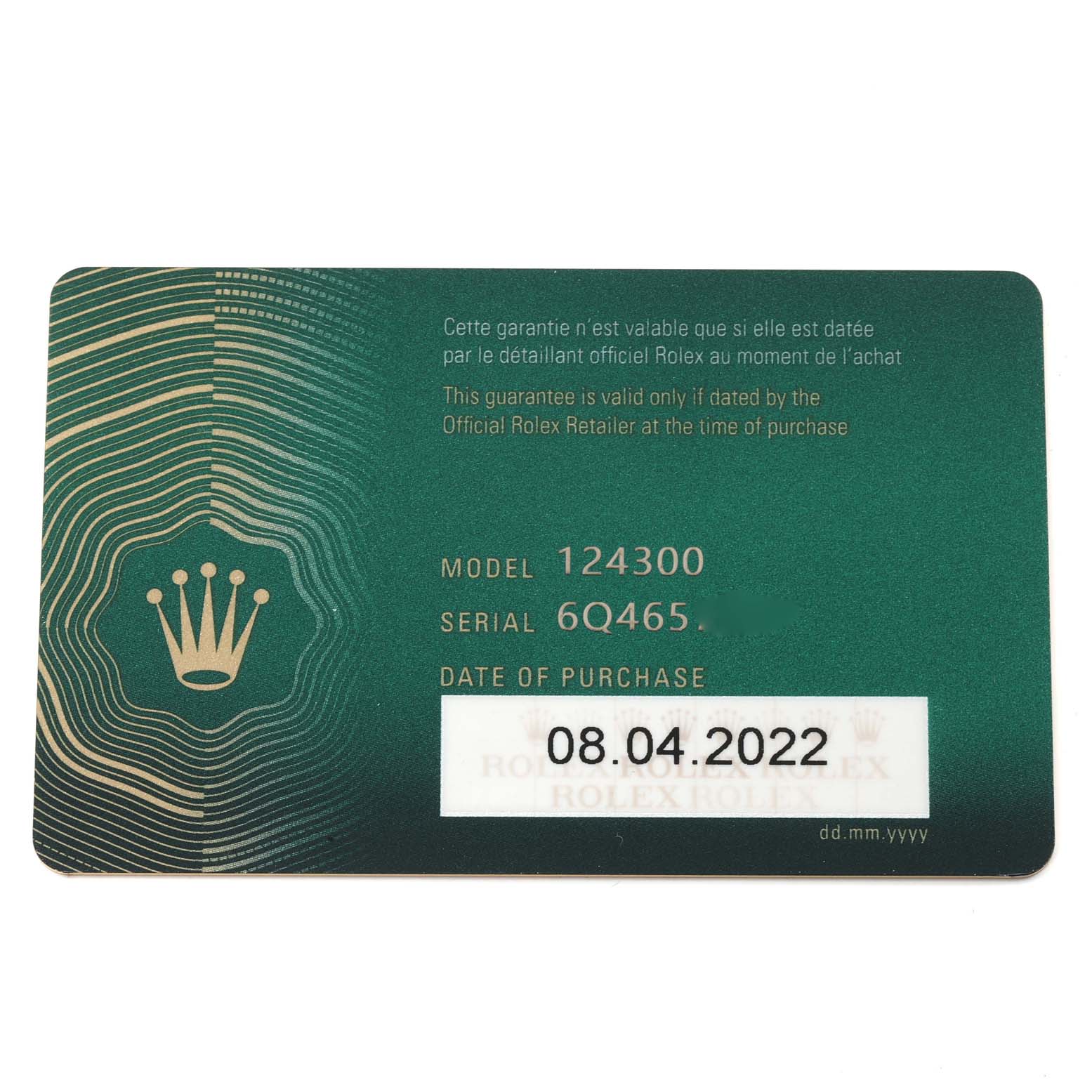 This image shows a warranty card for a Rolex Oyster Perpetual 124300 Men
s Stainless Steel Green Dial 124300 Men
s Stainless Steel Green Dial model, displaying the model number, serial number, and date of purchase.