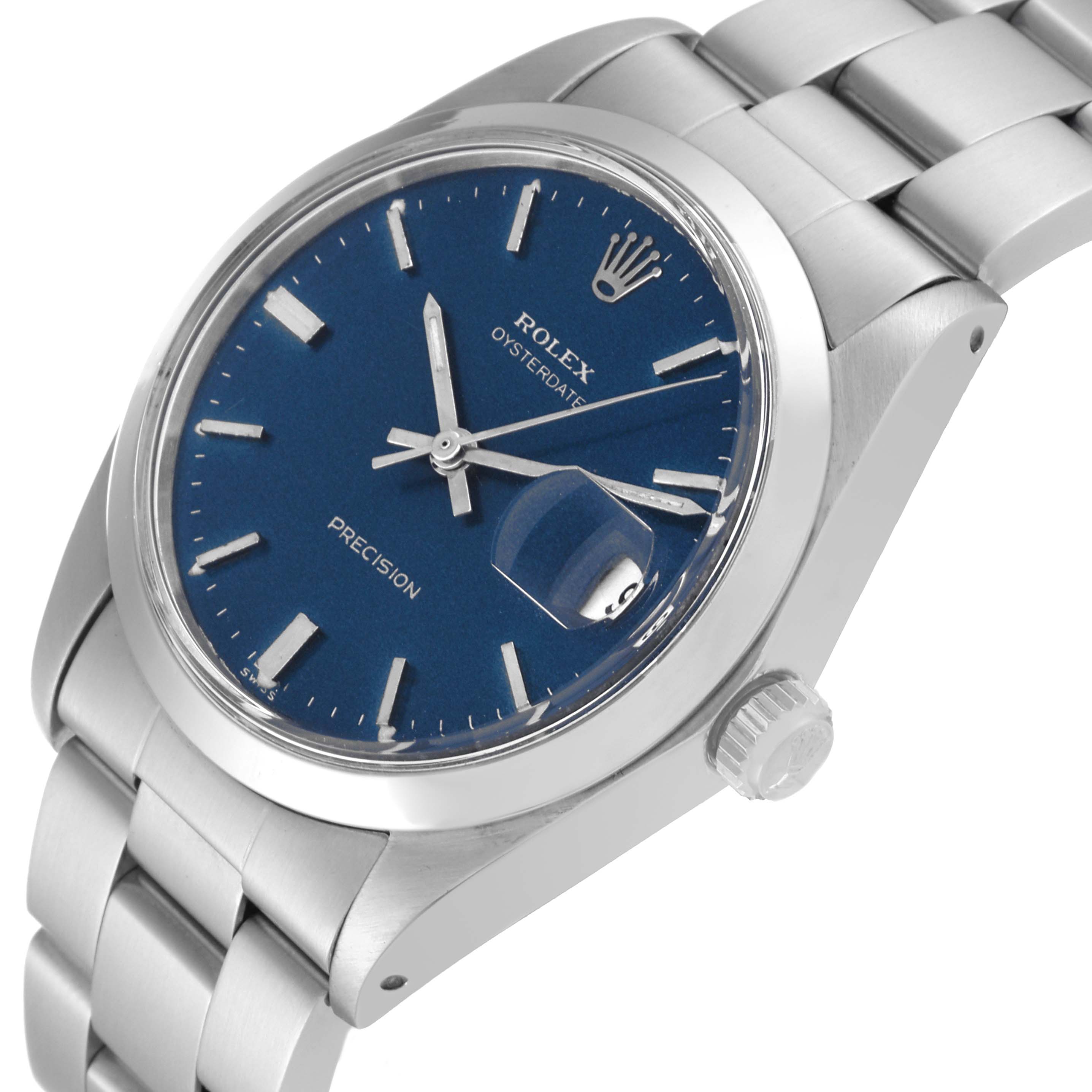 The image shows a Rolex Vintage Collection 6694 Men's Stainless Steel Blue Dial 6694 Men's Stainless Steel Blue Dial watch at an angle highlighting its blue dial, crown, and part of the metal bracelet.