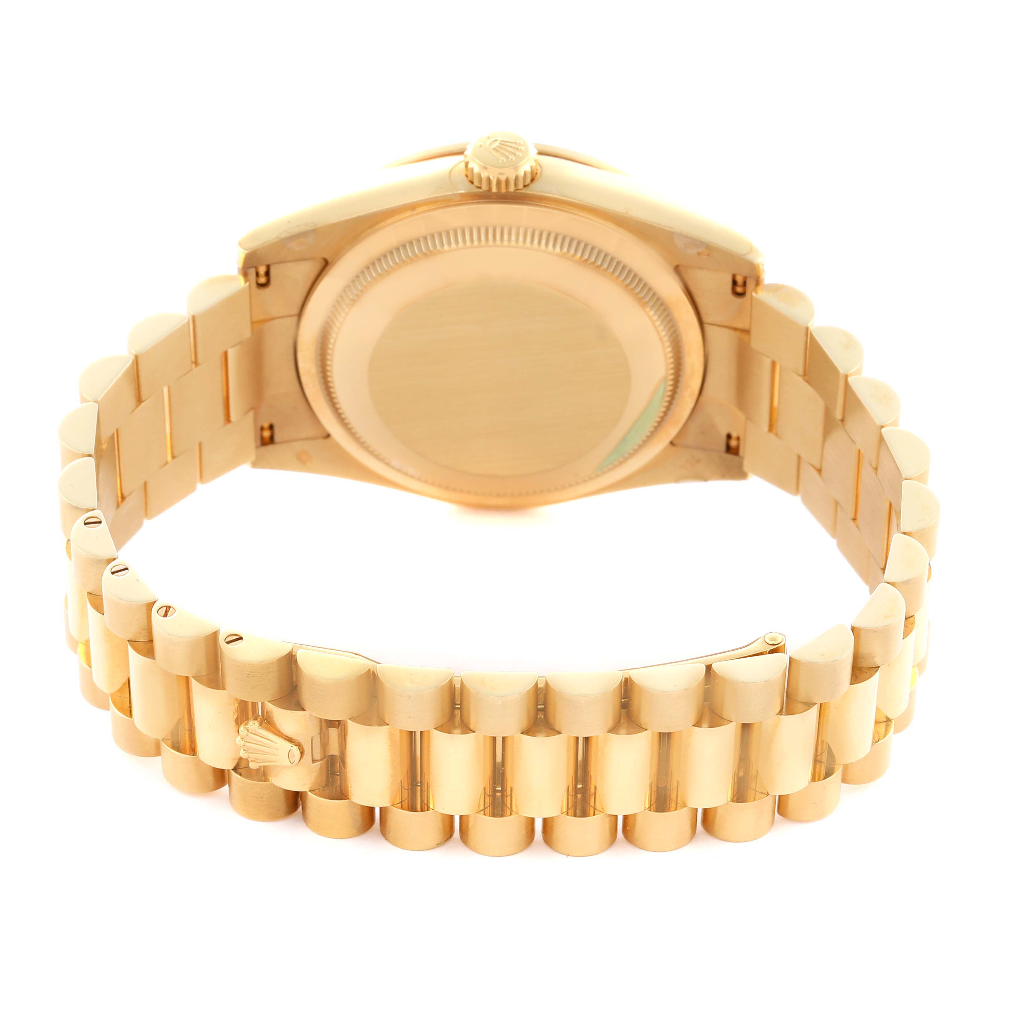 The Rolex President 118388 Men's Yellow Gold Champagne Dial 118388 Men's Yellow Gold Champagne Dial model is shown from the back, highlighting the bracelet and the closed case back.