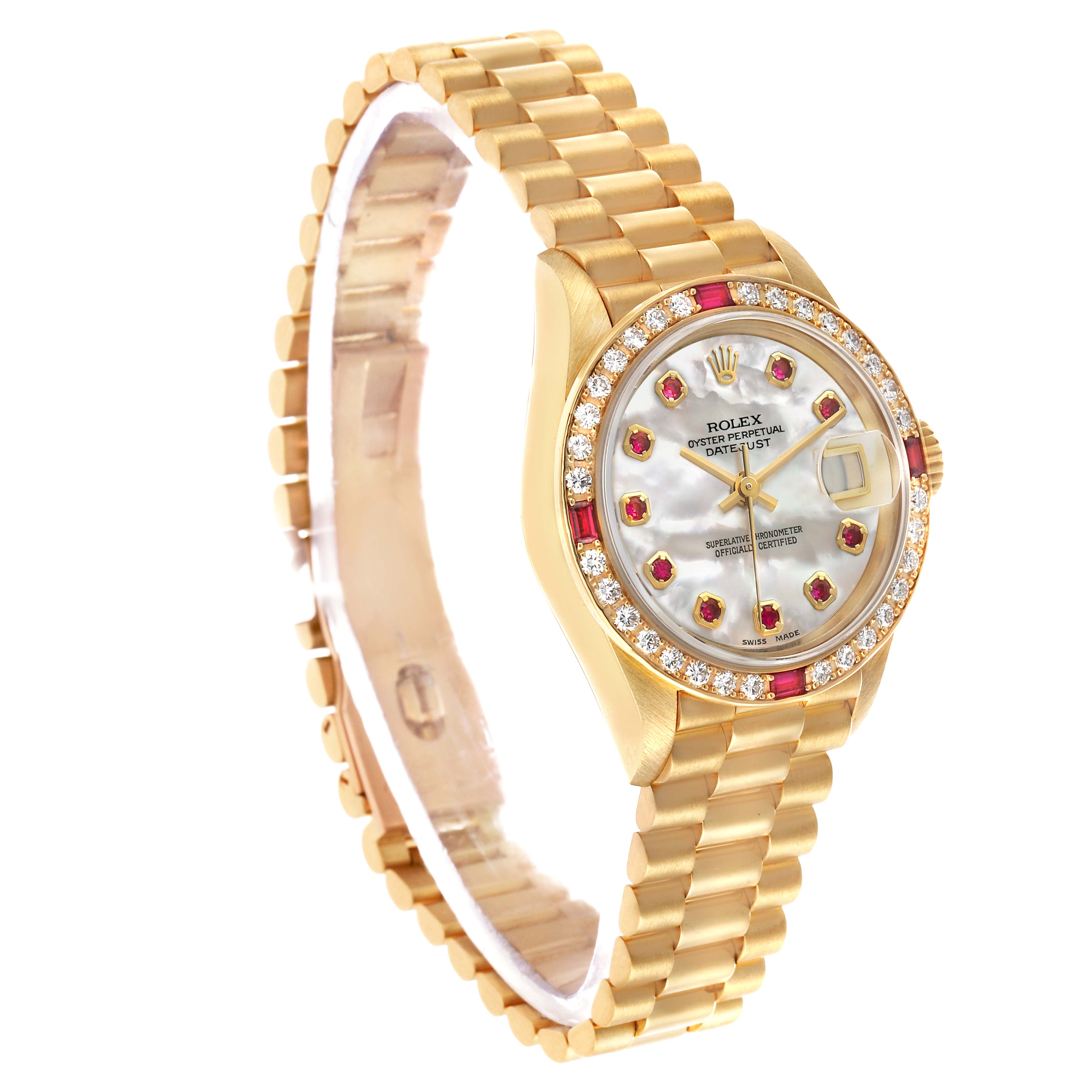 The Rolex President 69068 Women's Yellow Gold Mother of Pearl Dial watch is shown at an angled view, highlighting its gold bracelet, diamond-encrusted bezel, and ruby markers on the dial.