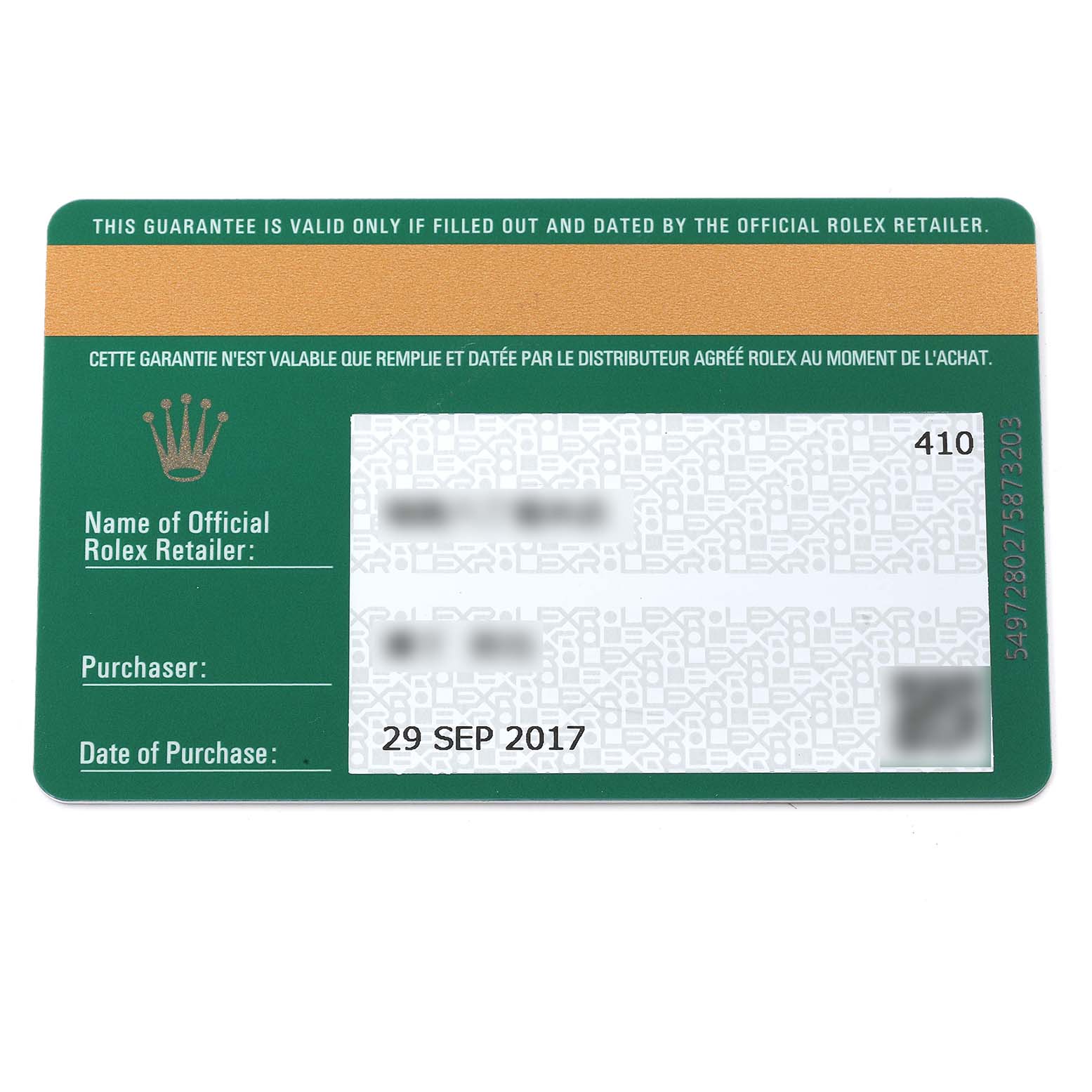 The image shows a close-up of a green and gold Rolex guarantee card for the Sea-Dweller model, dated 29 SEP 2017.