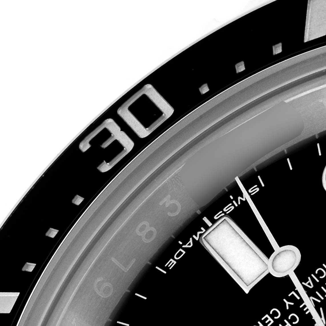 The image shows a close-up of the bezel and a portion of the dial of the Rolex Sea-Dweller 126600 Men
s Stainless Steel Black Dial 126600 Men
s Stainless Steel Black Dial watch.