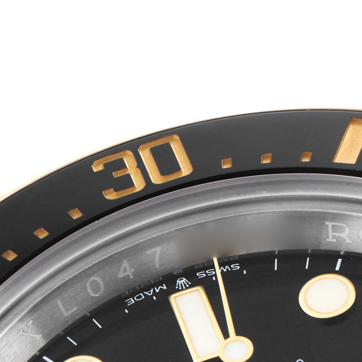 The image shows a close-up of the bezel and dial edge of a Rolex Sea-Dweller 126603 Men's Steel and Gold (two tone) Black Dial watch, highlighting the "30" marker in gold.