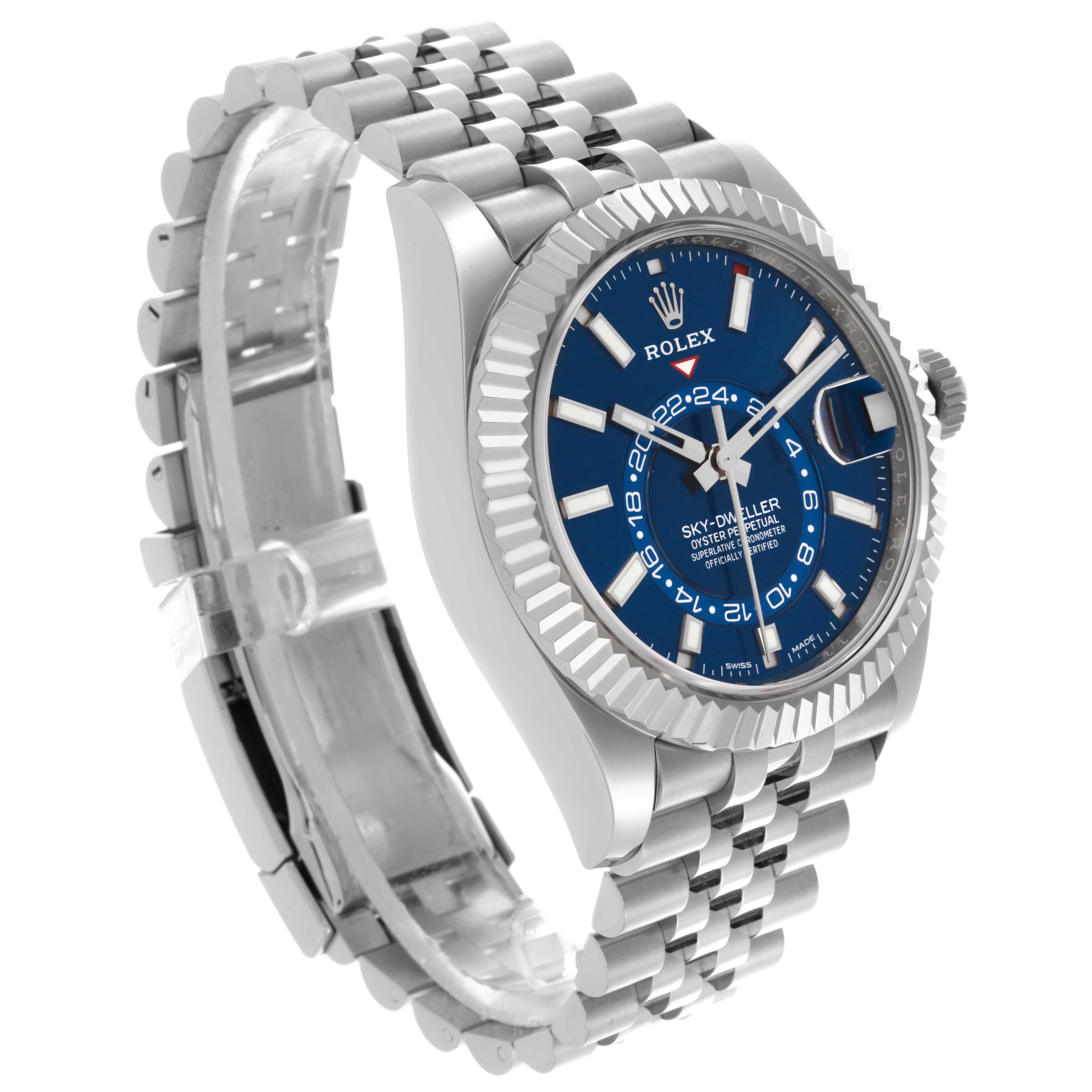 The Rolex Sky-Dweller 326934 Men
s Stainless Steel Blue Dial 326934 Men
s Stainless Steel Blue Dial is shown at a side angle, highlighting the blue dial, fluted bezel, and Jubilee bracelet.
