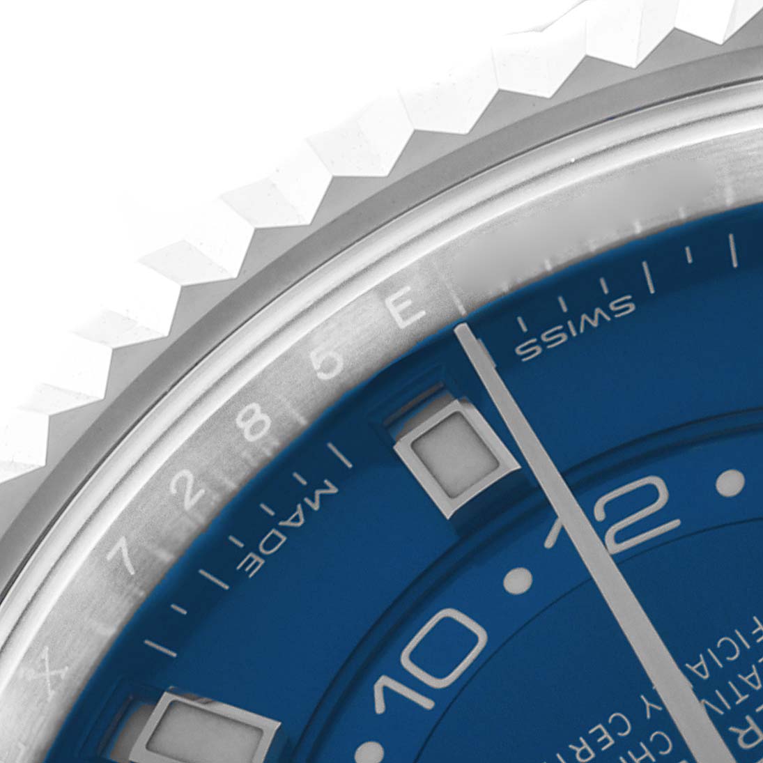 The image shows a close-up of the Rolex Sky-Dweller 326934 Men
s Stainless Steel Blue Dial 326934 Men
s Stainless Steel Blue Dial, highlighting the blue dial and part of the bezel.