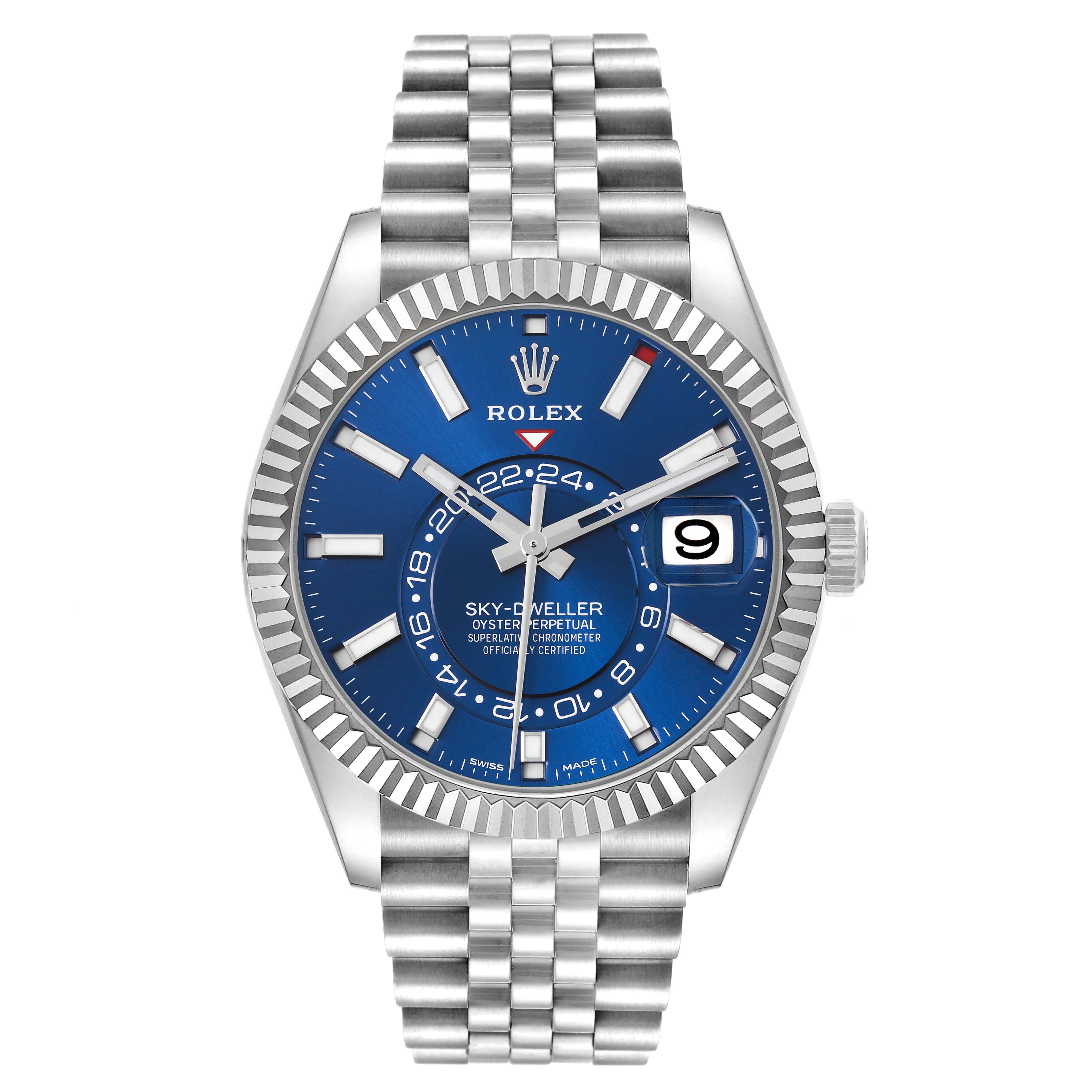 The Rolex Sky-Dweller 326934 Men
s Stainless Steel Blue Dial 326934 Men
s Stainless Steel Blue Dial watch is shown from a frontal angle, displaying the blue dial, hour markers, and Jubilee bracelet.