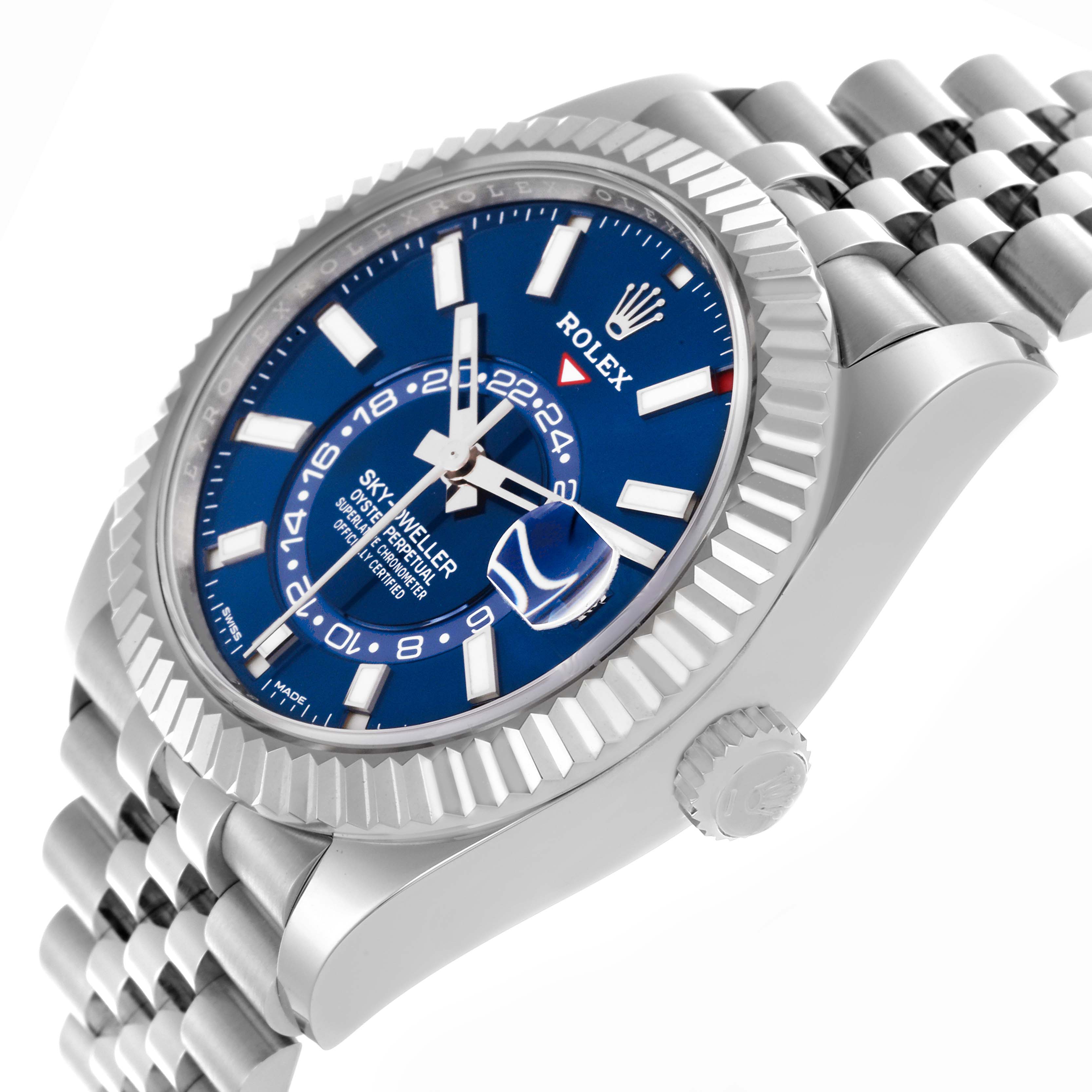 The Rolex Sky-Dweller 326934 Men
s Stainless Steel Blue Dial 326934 Men
s Stainless Steel Blue Dial is shown from a side angle, highlighting the fluted bezel, blue dial, and bracelet.