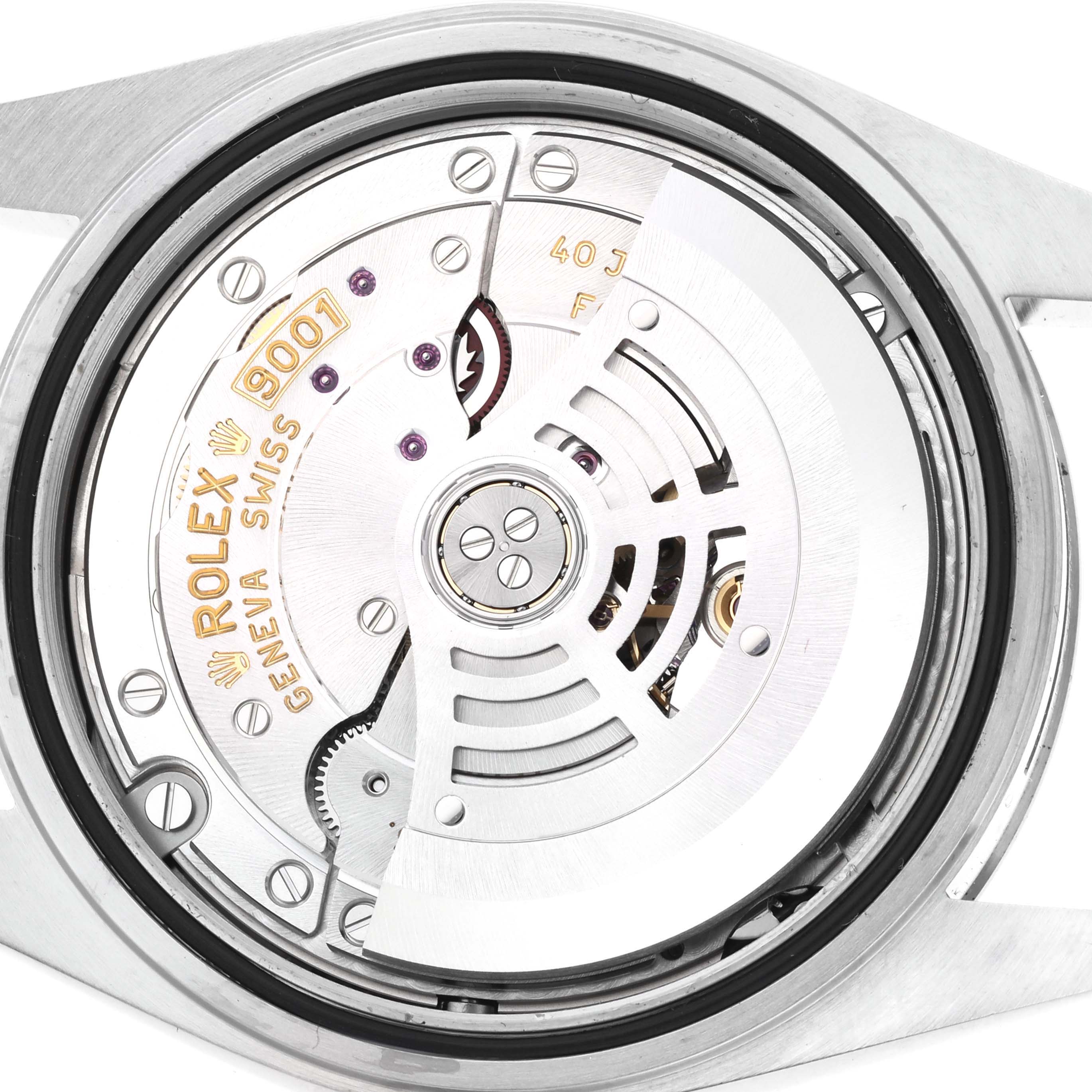 The image shows a detailed view of the movement inside the Rolex Sky-Dweller 326934 Men's Stainless Steel Blue Dial 326934 Men's Stainless Steel Blue Dial, highlighting the rotor and gear mechanism.