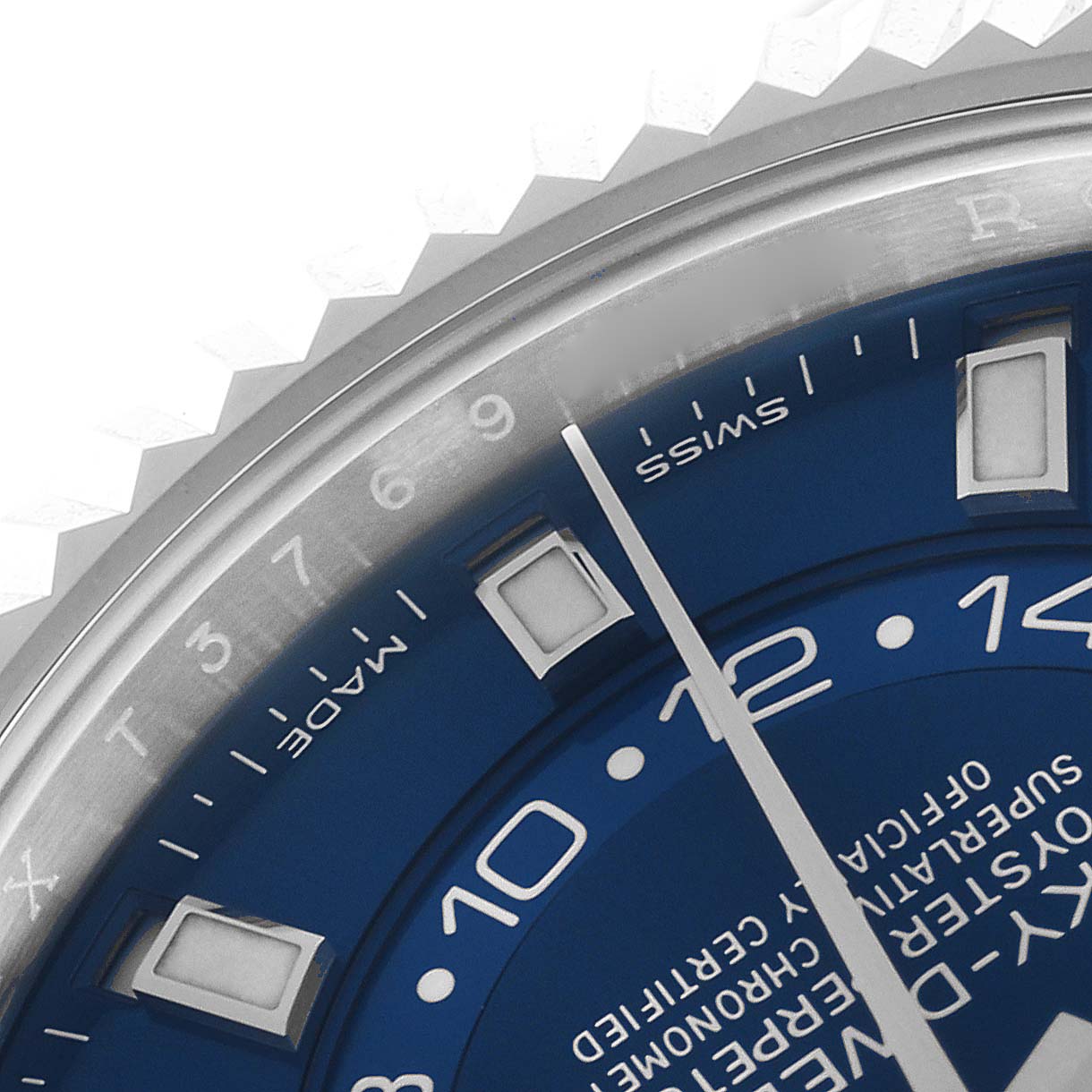 The image shows a close-up of the Rolex Sky-Dweller 326934 Men's Stainless Steel Blue Dial 326934 Men's Stainless Steel Blue Dial's blue dial, with part of the bezel and indices visible.