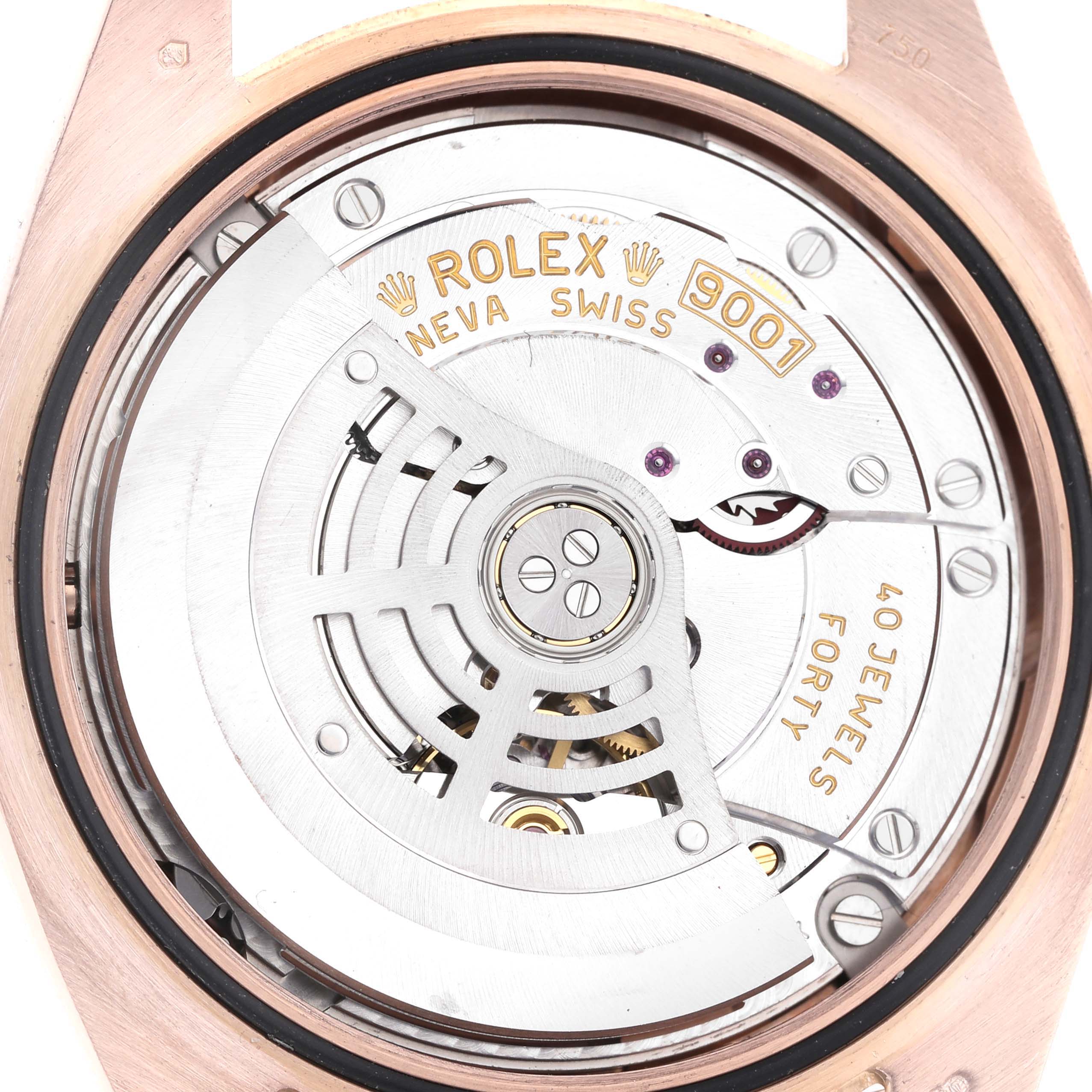 The image shows an exposed view of the movement and internals of a Rolex Sky-Dweller 326935 Men's Rose Gold Pink Dial 326935 Men's Rose Gold Pink Dial watch, showcasing the mechanism and jewel inlays.