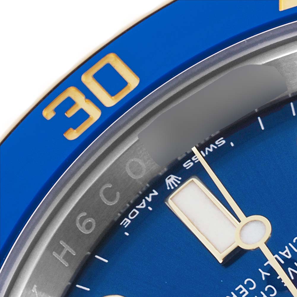 The image shows a close-up angle of the blue bezel and dial of a Rolex Submariner 126613LB Men's Steel and Gold (two tone) Blue Dial 126613LB Men's Steel and Gold (two tone) Blue Dial watch.