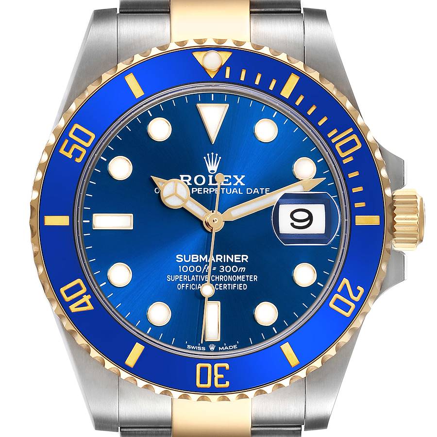 The Rolex Submariner watch is shown from a top-down angle, highlighting the dial, bezel, and part of the bracelet.