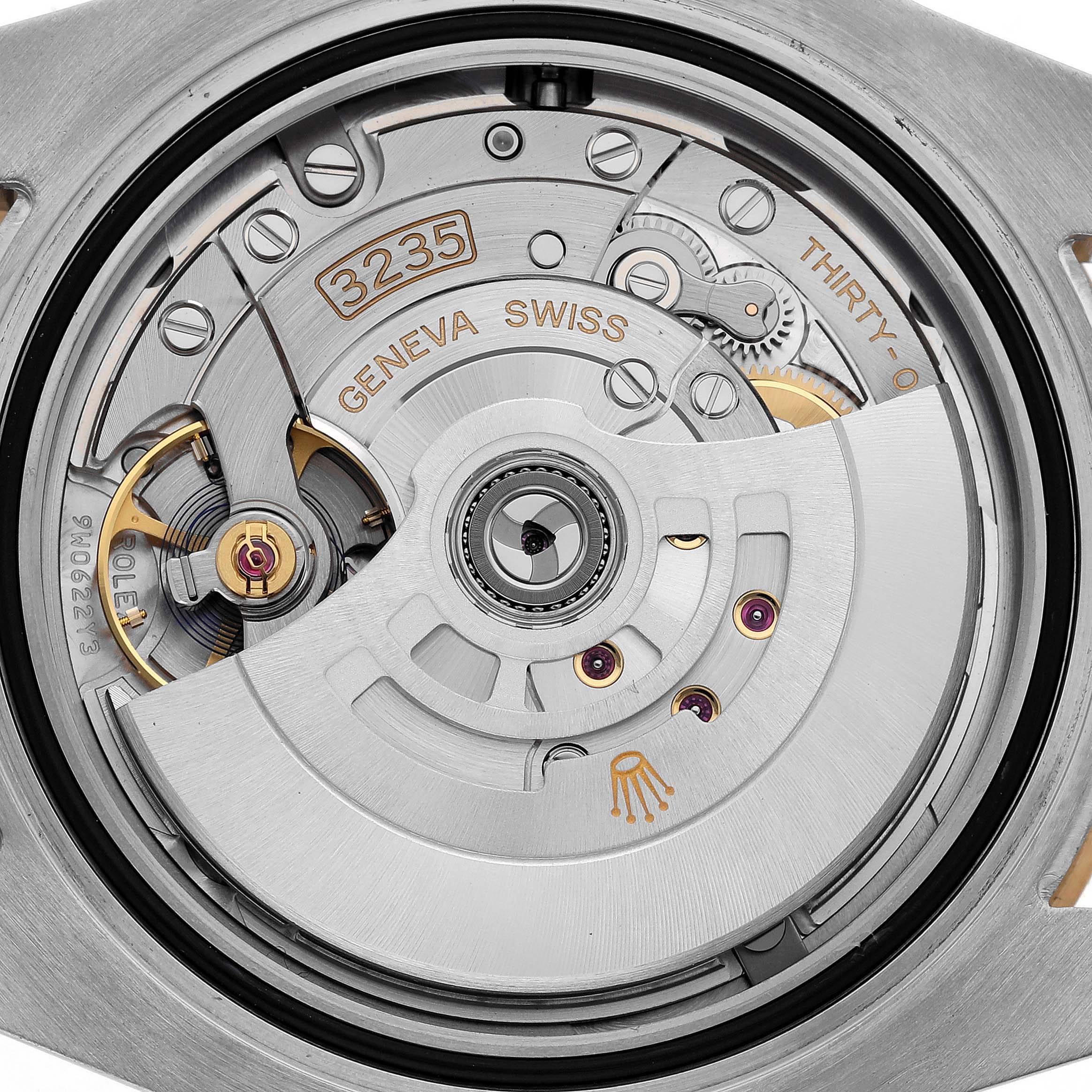 The image shows the movement mechanism of the Rolex Submariner 126613LB Men's Steel and Gold (two tone) Blue Dial 126613LB Men's Steel and Gold (two tone) Blue Dial watch from a top-down angle.