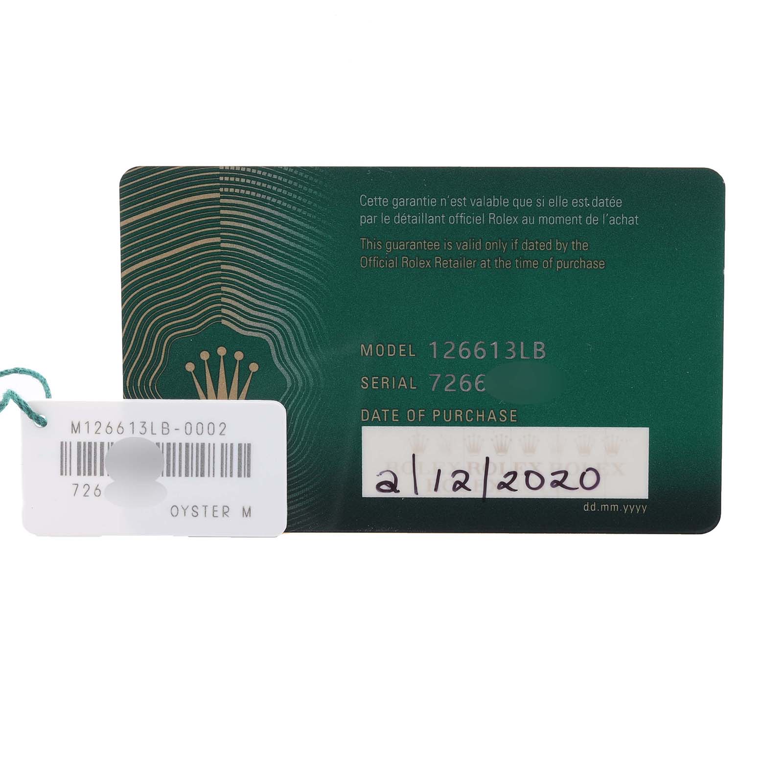 The image shows a Rolex Submariner 126613 Men's Steel and Gold (two tone) Blue Dial 126613 Men's Steel and Gold (two tone) Blue Dial warranty card with model 126613LB and serial number, alongside a barcode tag.