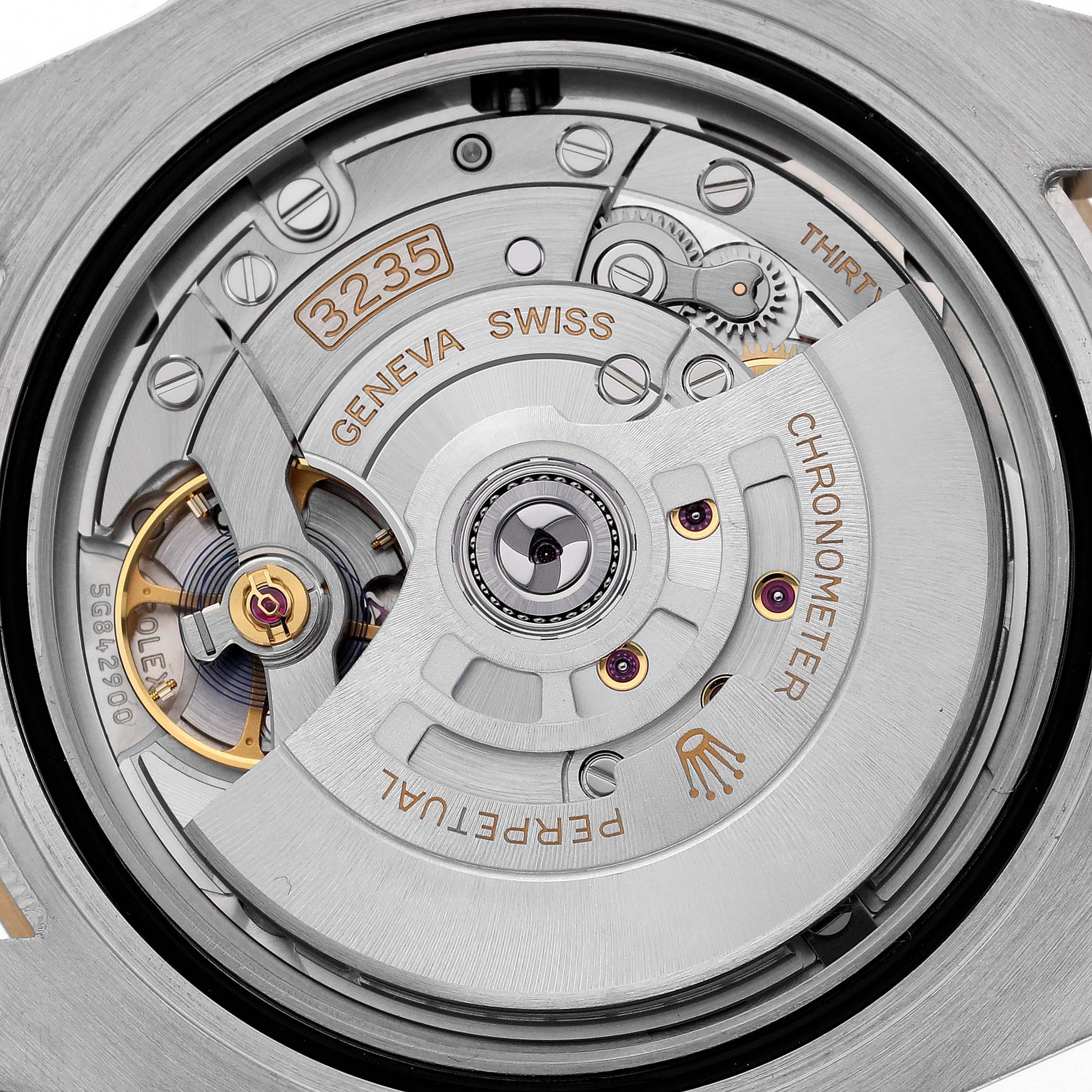 The image shows the back view of a Rolex Submariner 126613LB Men's Steel and Gold (two tone) Blue Dial 126613LB Men's Steel and Gold (two tone) Blue Dial, highlighting its intricate movement and components.