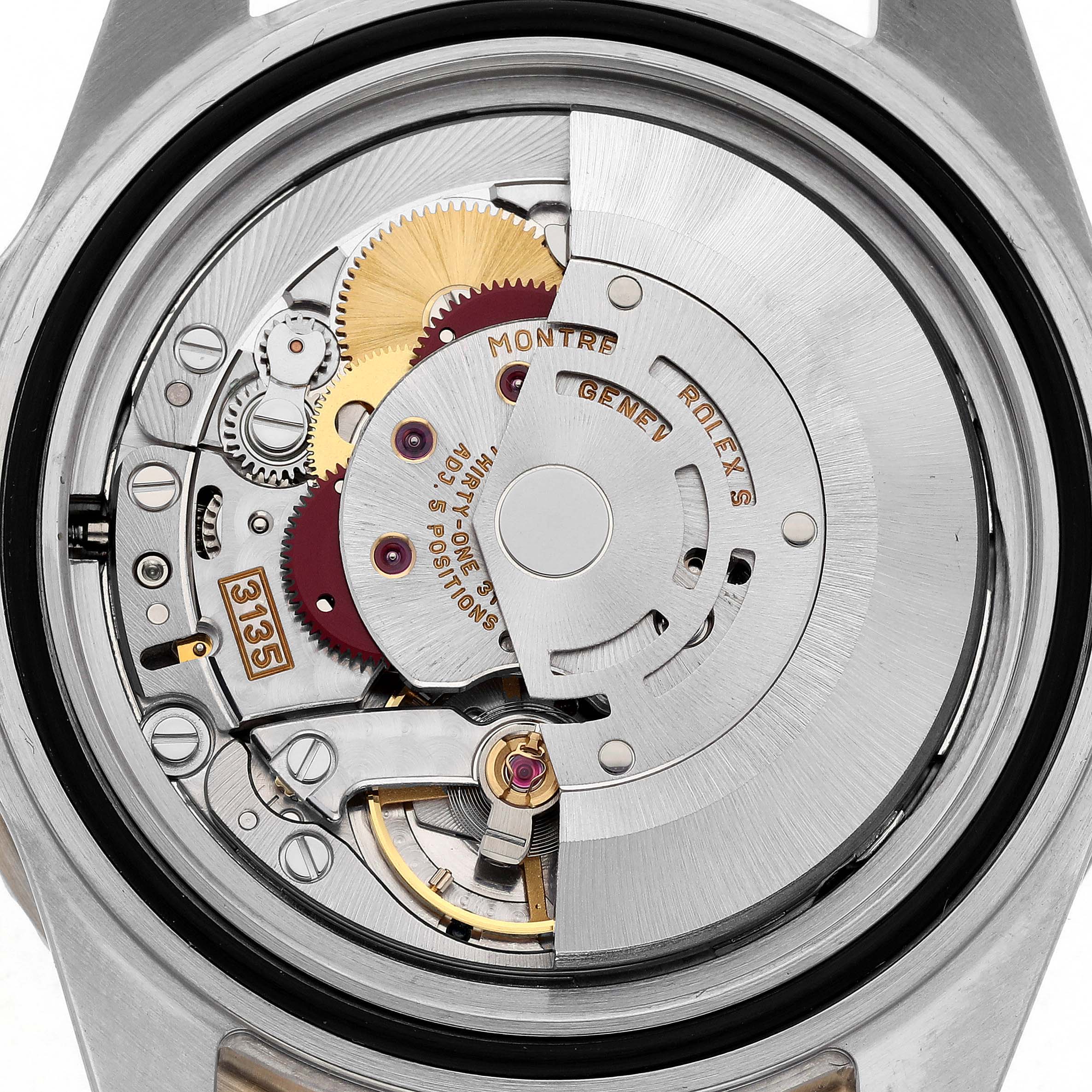 The image shows the internal mechanism of a Rolex Submariner 16613 Men's Steel and Gold (two tone) Blue Dial 16613 Men's Steel and Gold (two tone) Blue Dial watch from a top-down angle, highlighting the intricate gears and rotor.