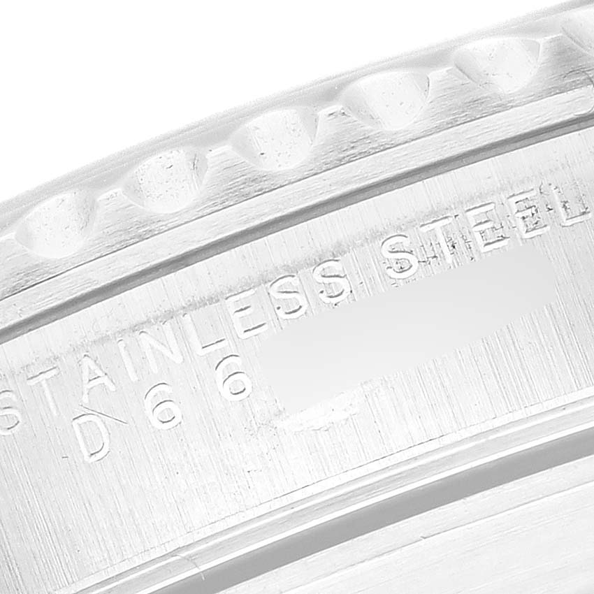 This close-up image shows the stainless steel engraving on the case back of a Rolex Submariner 14060 Men
s Stainless Steel Black Dial 14060 Men
s Stainless Steel Black Dial model watch.