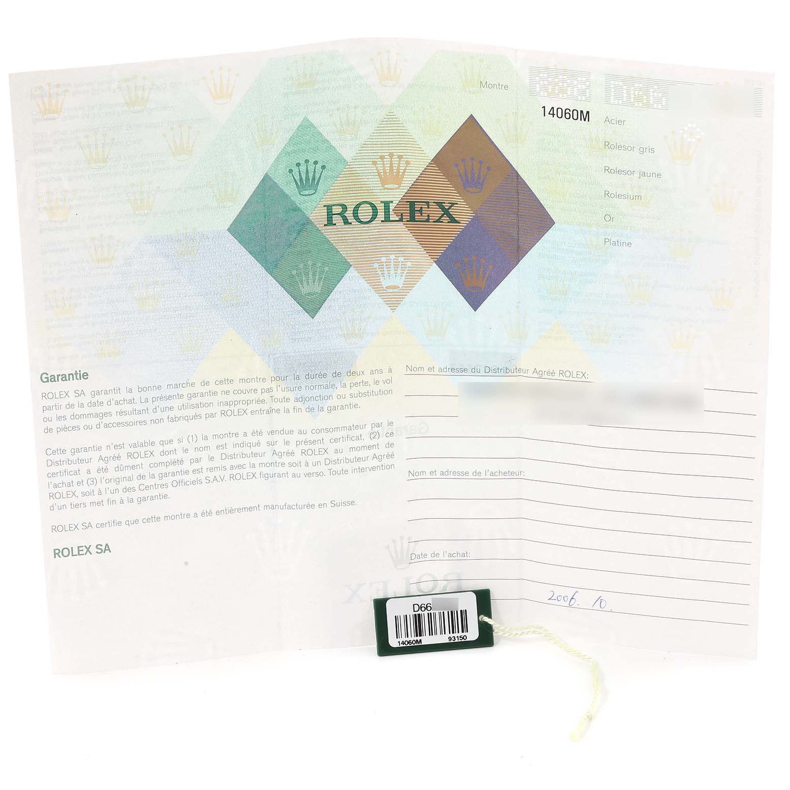 The image shows the warranty card and a green tag for the Rolex Submariner 14060 Men
s Stainless Steel Black Dial 14060 Men
s Stainless Steel Black Dial model 14060M.