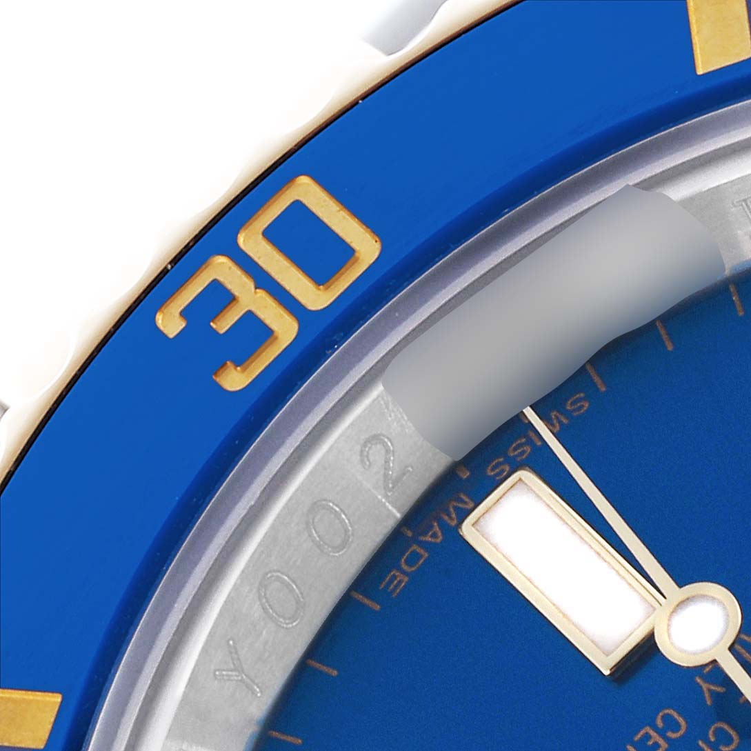 The image shows a close-up of the blue and gold bezel and dial of the Rolex Submariner 116613LN Men
s Steel and Gold (two tone) Blue Dial 116613LN Men
s Steel and Gold (two tone) Blue Dial watch.