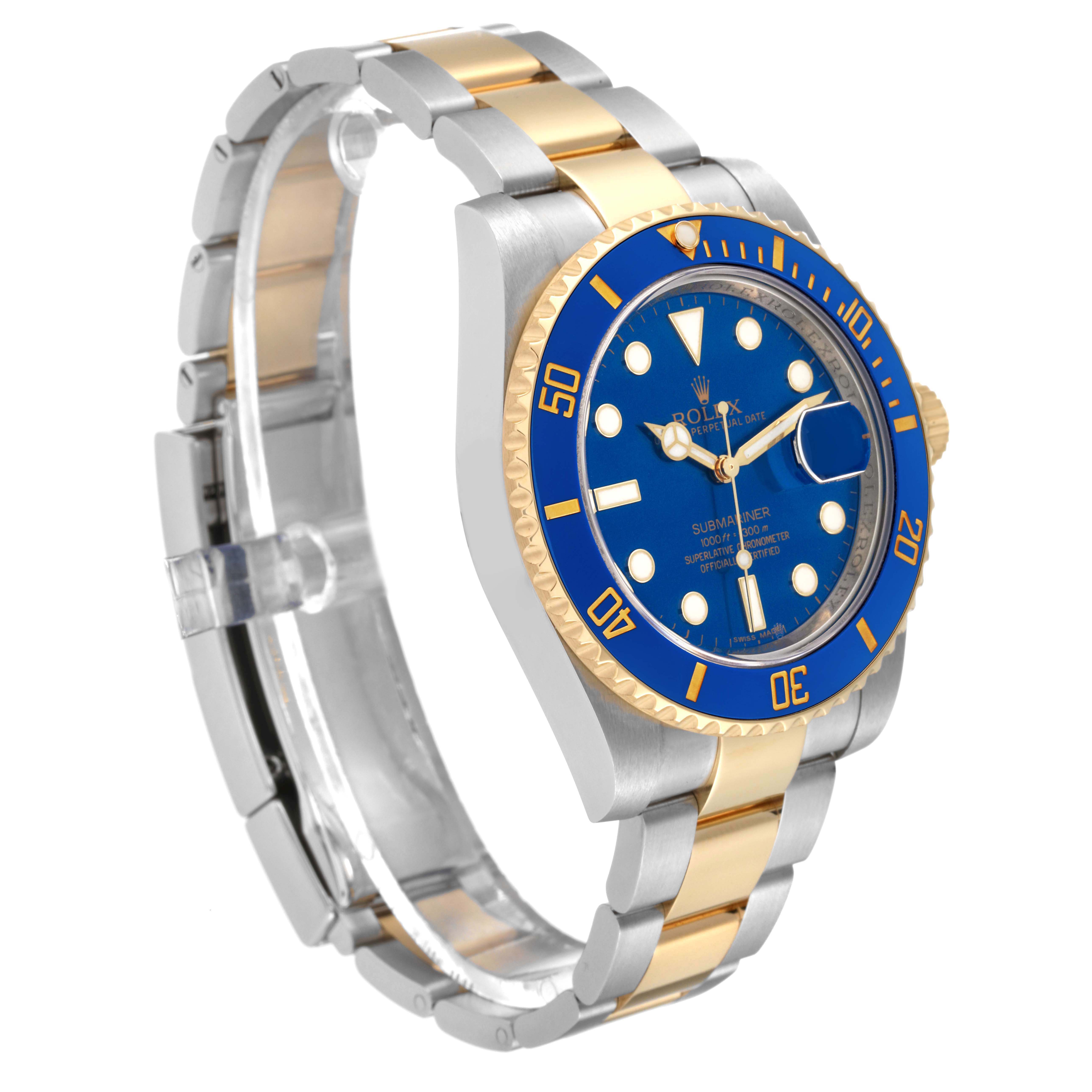 The Rolex Submariner 116613LN Men
s Steel and Gold (two tone) Blue Dial 116613LN Men
s Steel and Gold (two tone) Blue Dial is shown at an angle highlighting the blue dial, gold and silver bezel, and two-tone bracelet.