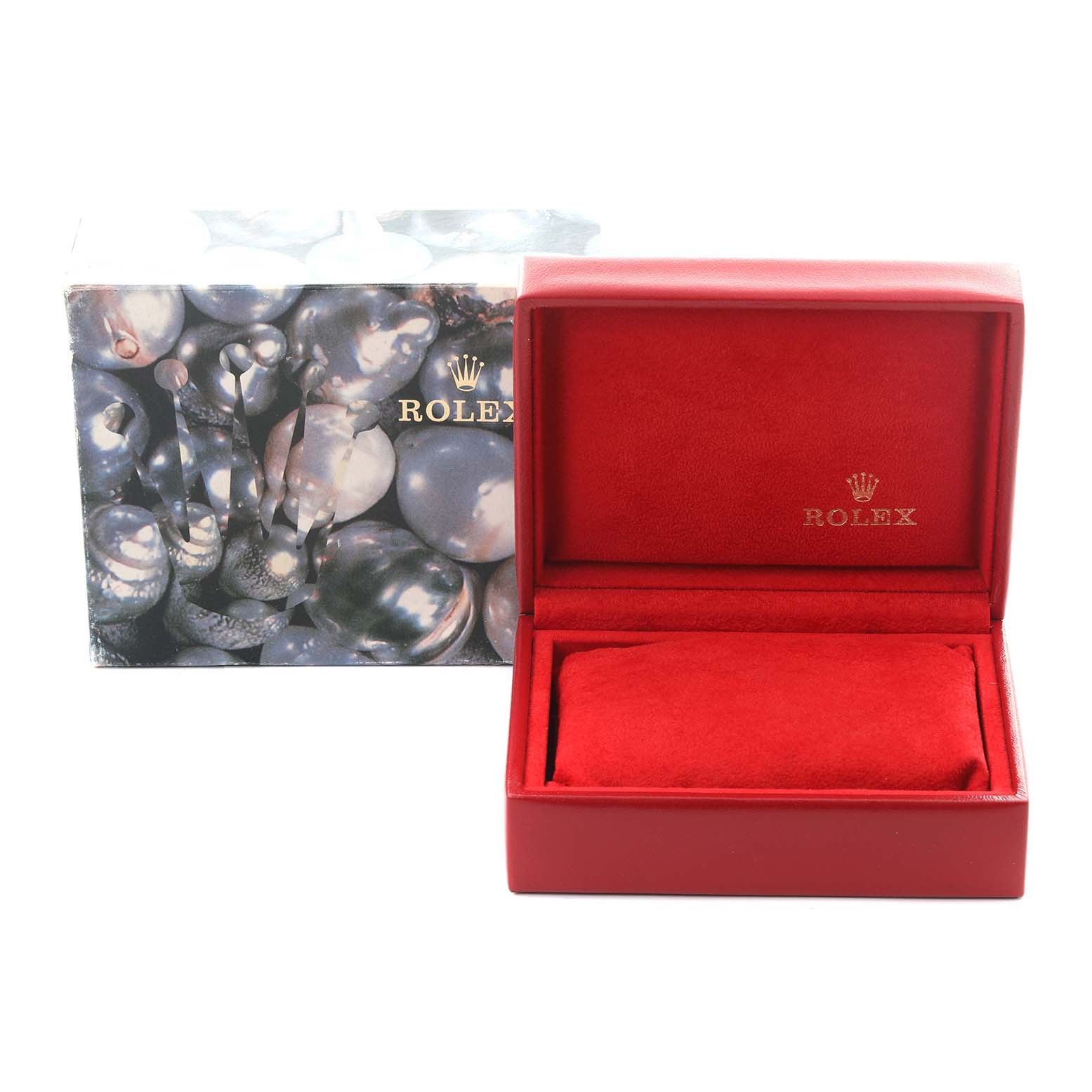 The image shows a Rolex Yacht-Master 169622 Women's Stainless Steel Silver Dial 169622 Women's Stainless Steel Silver Dial watch box and packaging, highlighting the red interior and decorative exterior.