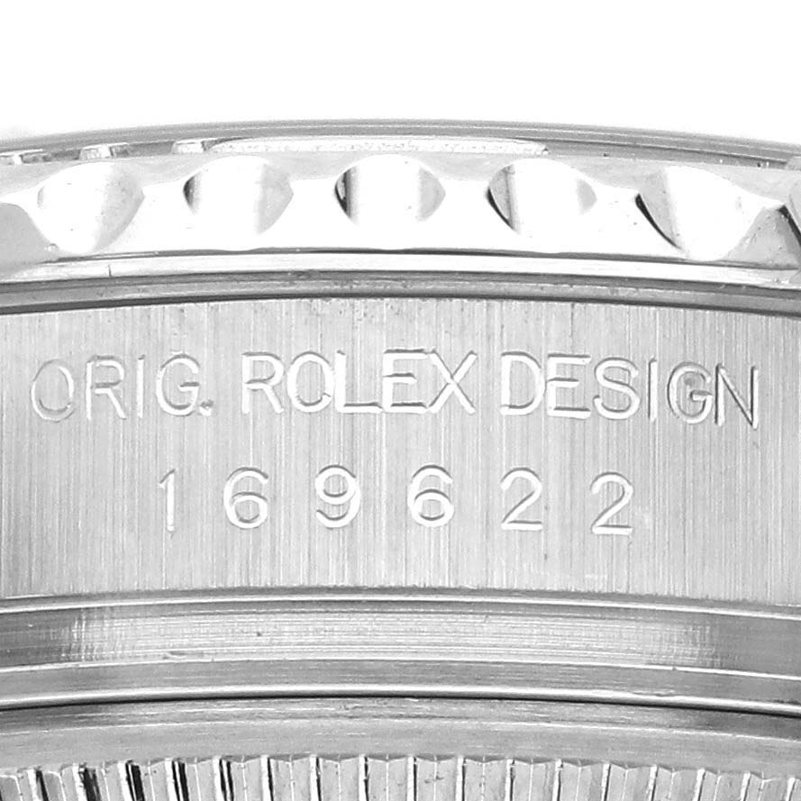 The image shows the side of the Rolex Yacht-Master 169622 Women's Stainless Steel Silver Dial 169622 Women's Stainless Steel Silver Dial, featuring "ORIG. ROLEX DESIGN" and model number engraving.