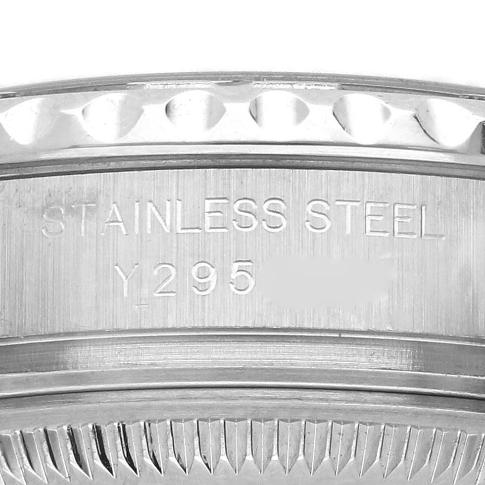 The image shows the engraved side of the Rolex Yacht-Master 169622 Women's Stainless Steel Silver Dial 169622 Women's Stainless Steel Silver Dial watch case, highlighting "STAINLESS STEEL" and the serial number.