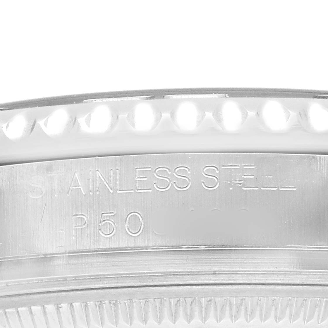 The image shows a close-up side view of the bezel and outer edge of the Rolex Yacht-Master 168622 Men's Stainless Steel Silver Dial watch, highlighting the stainless steel engraving.