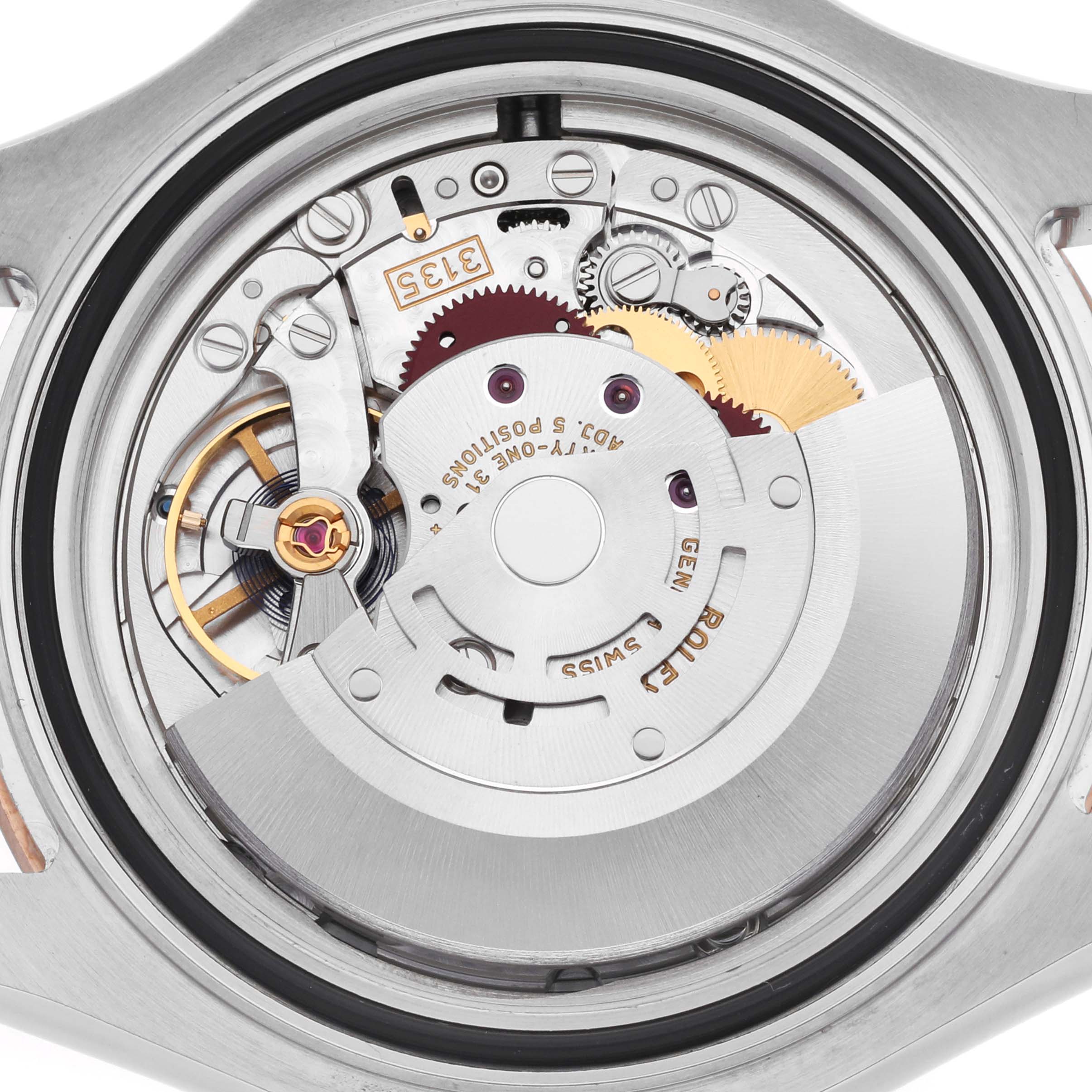 The image shows the Rolex Yacht-Master 116621 Men's Steel and Gold (two tone) Brown Dial's movement from a top view, highlighting gears and components.