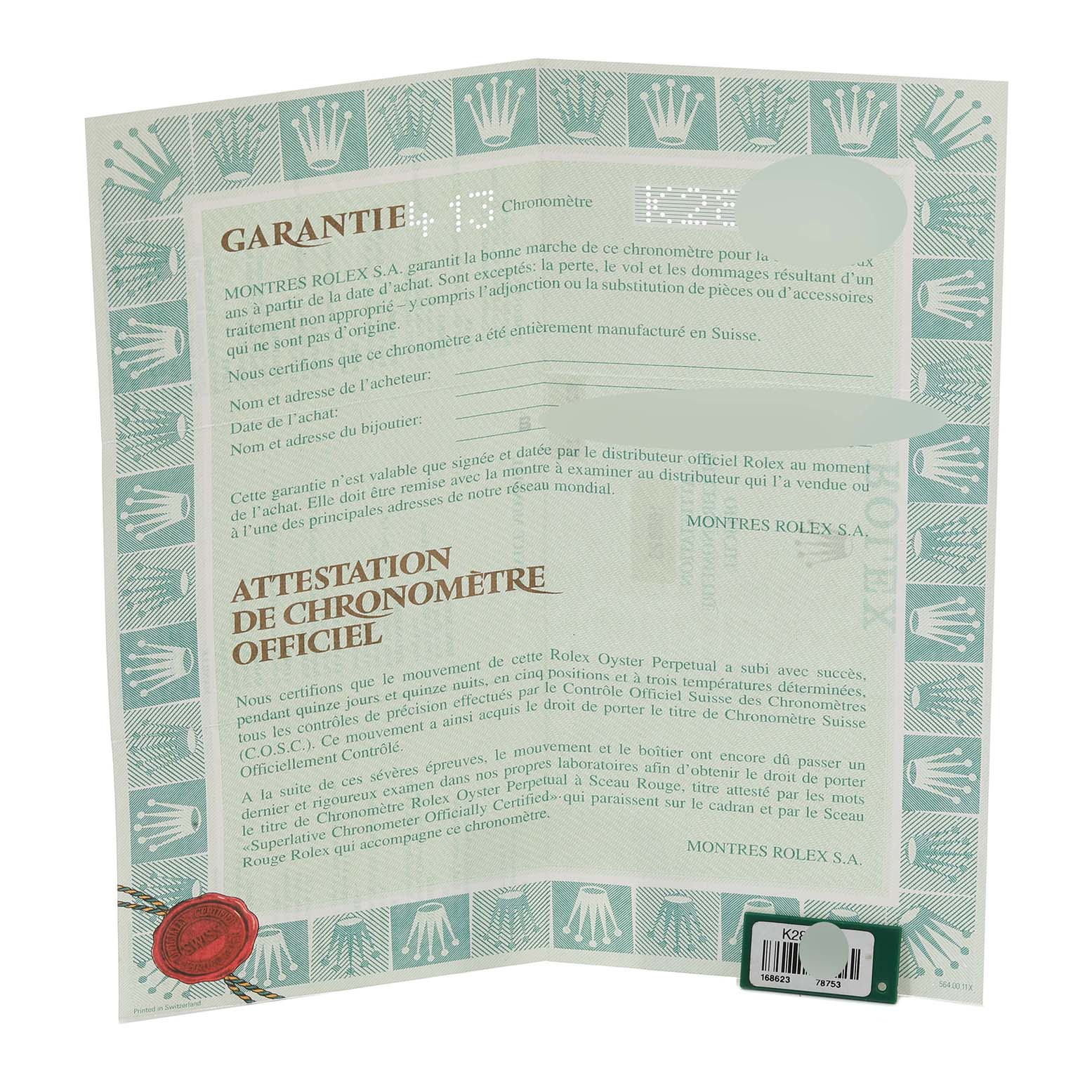 The image shows the warranty document for a Rolex Yacht-Master 168623 Men
s Steel and Gold (two tone) White Dial 168623 Men
s Steel and Gold (two tone) White Dial watch, displaying text and official seals.