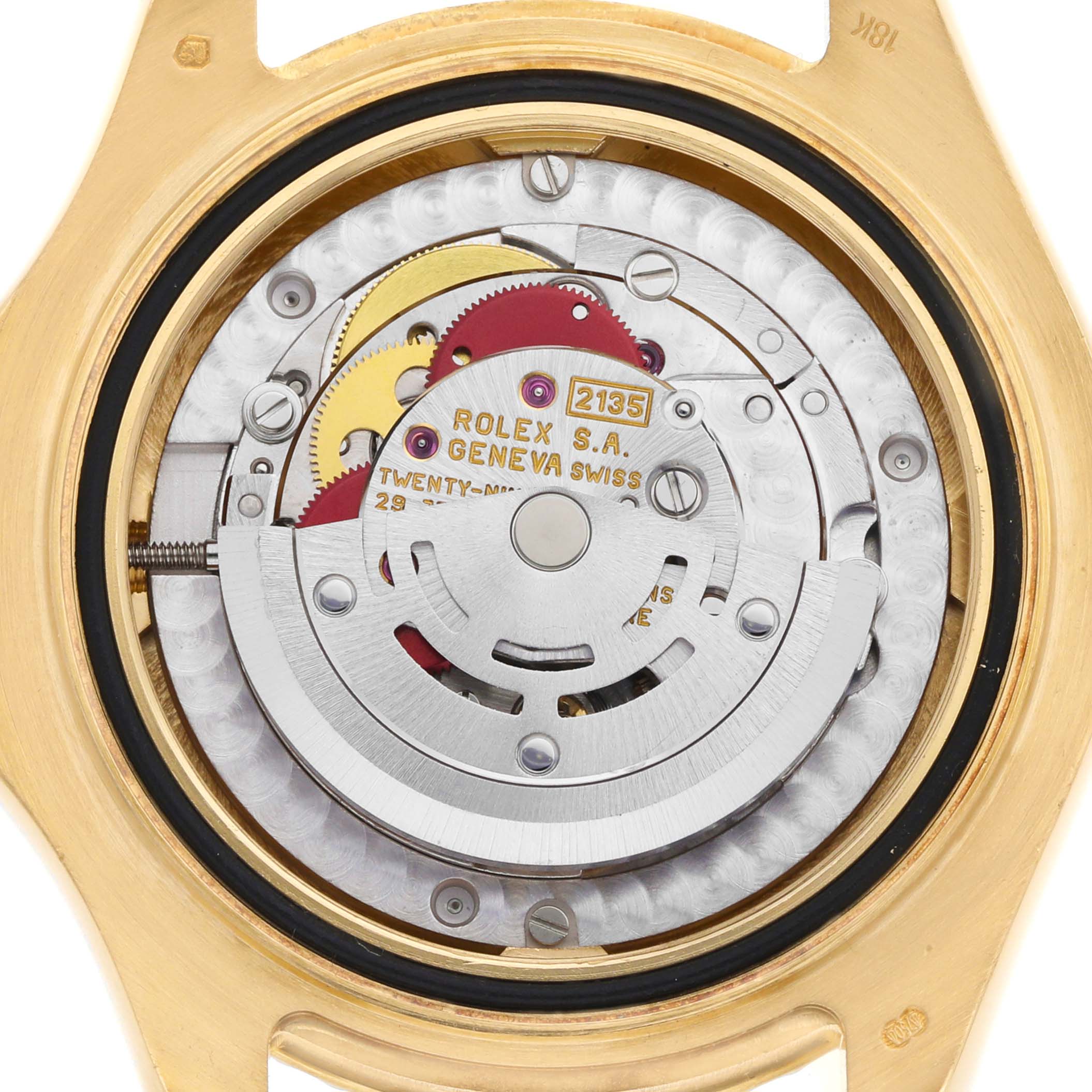 The image shows the movement of a Rolex Yacht-Master 68628 Men's Yellow Gold White Dial watch from a back angle, highlighting its intricate internal components.