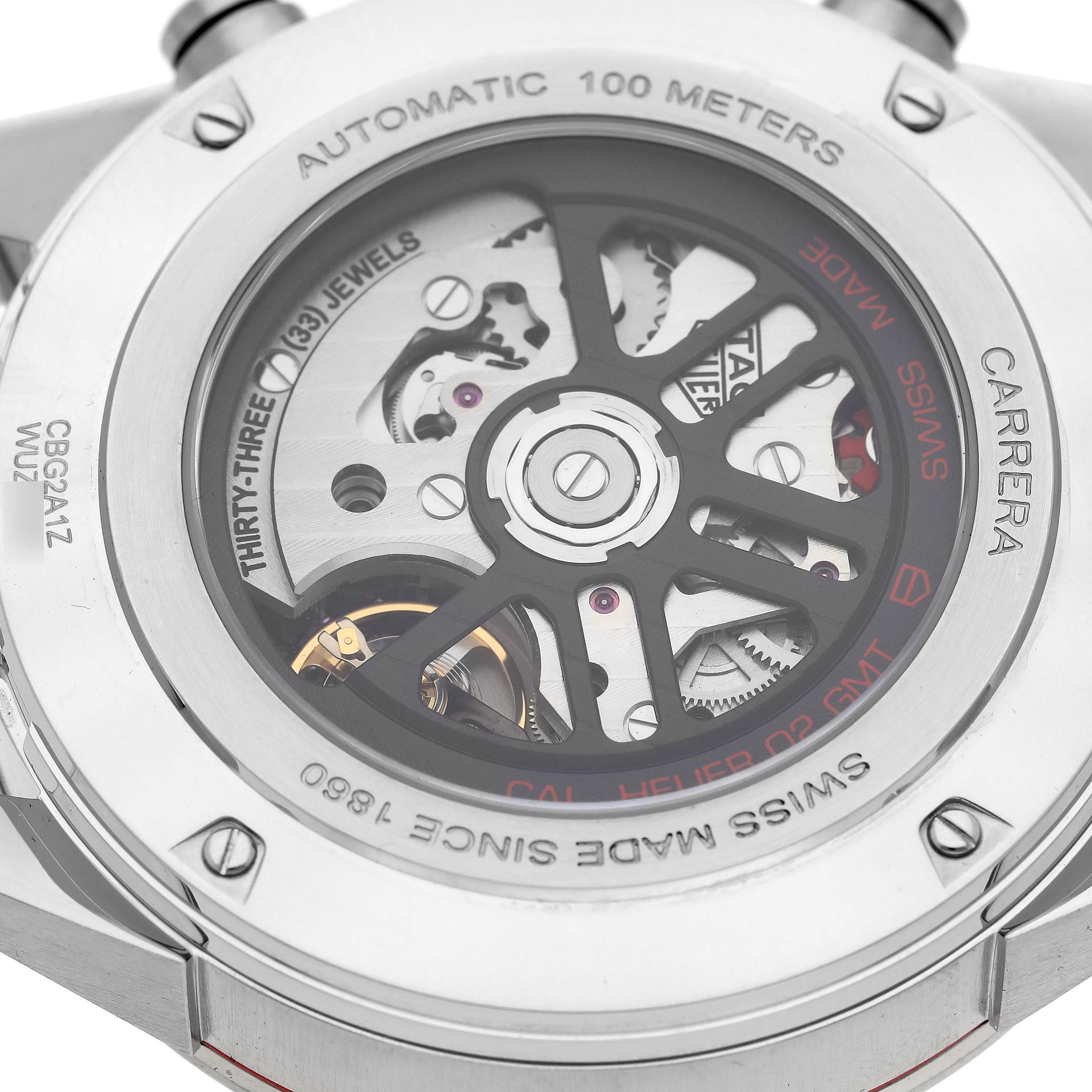 The image shows the back view of a Tag Heuer Carrera CBG2A1Z.BA0658 Men's Stainless Steel Black Dial CBG2A1Z.BA0658 Men's Stainless Steel Black Dial watch, displaying the internal mechanism and inscriptions.