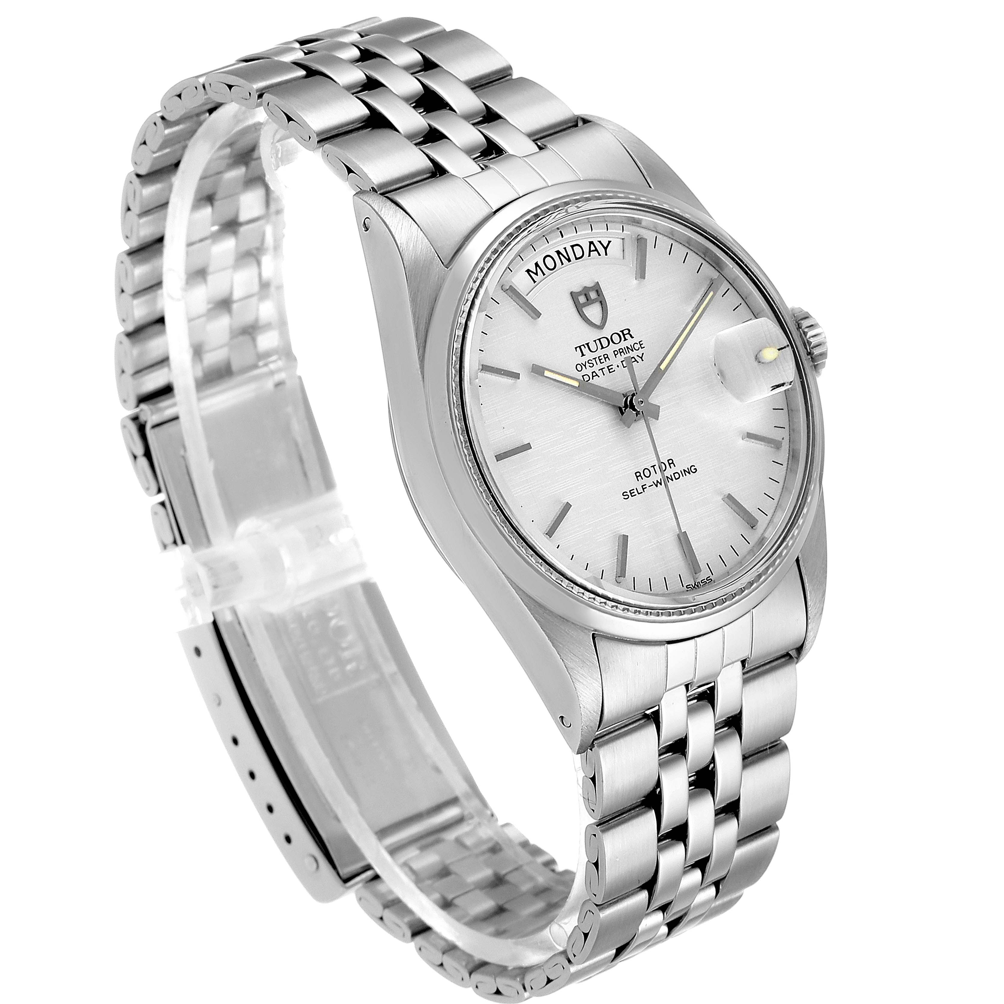 The image shows a three-quarter view of the Tudor Prince 94710 Men
s Stainless Steel Silver Dial 94710 Men
s Stainless Steel Silver Dial model watch, highlighting the face, bracelet, and crown.