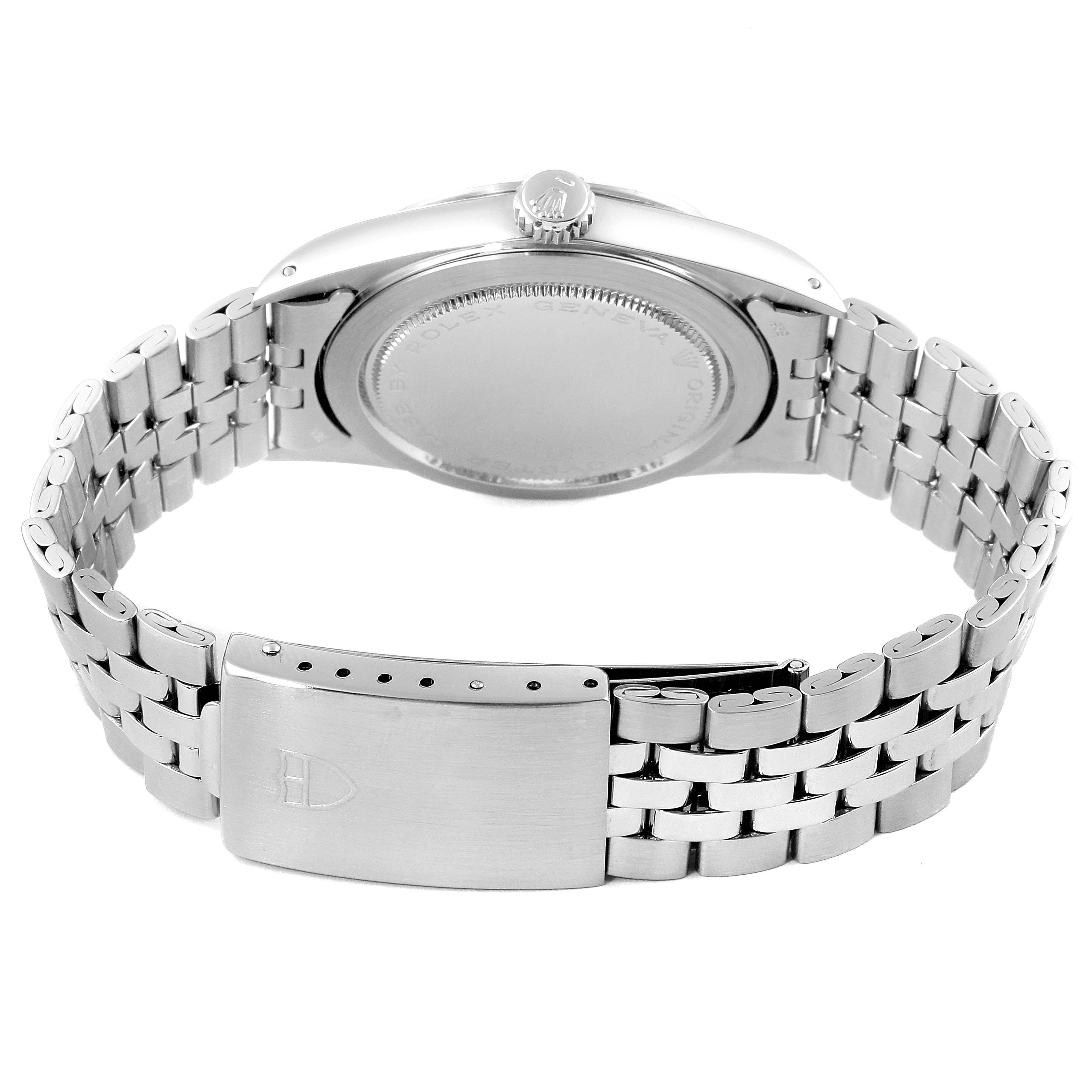 The image shows the back view of the Tudor Prince 94710 Men
s Stainless Steel Silver Dial 94710 Men
s Stainless Steel Silver Dial watch, displaying the case back, crown, and stainless steel bracelet with clasp.