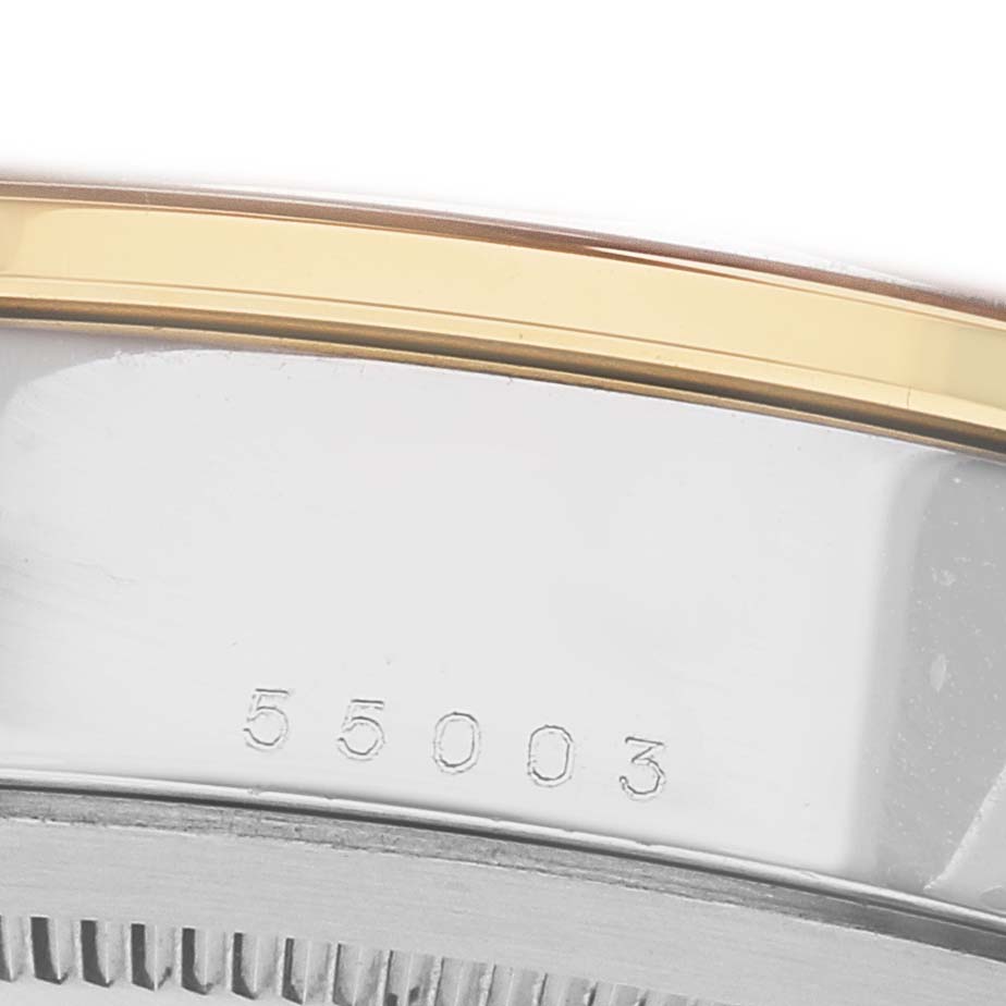 The image shows a close-up of the case side of the Tudor Glamour 55003-0007 Men's Steel and Gold (two tone) Black Dial model, highlighting the serial number.